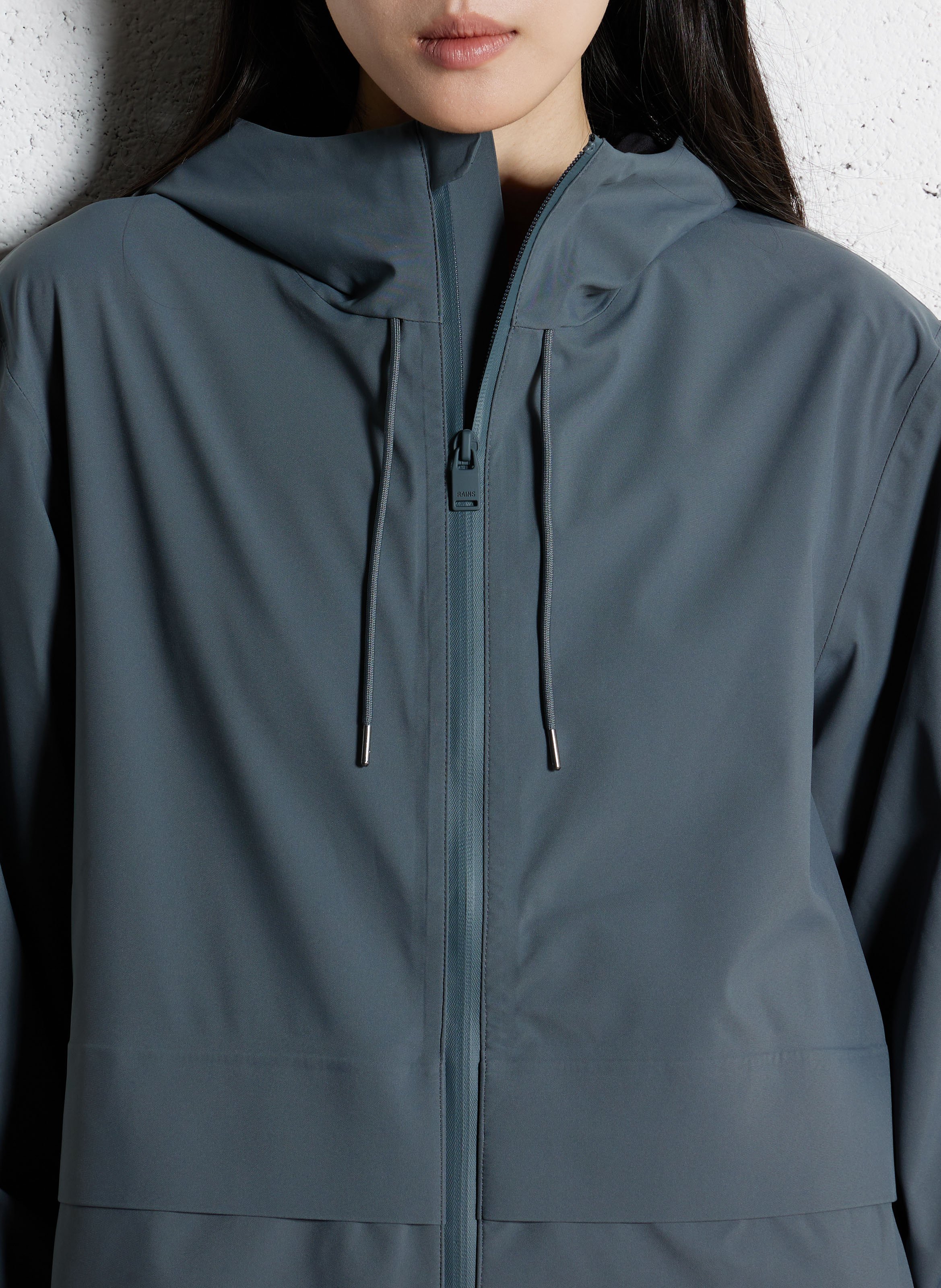 Buttoned and zipped high-neck fitted raincoat RAINS Blue