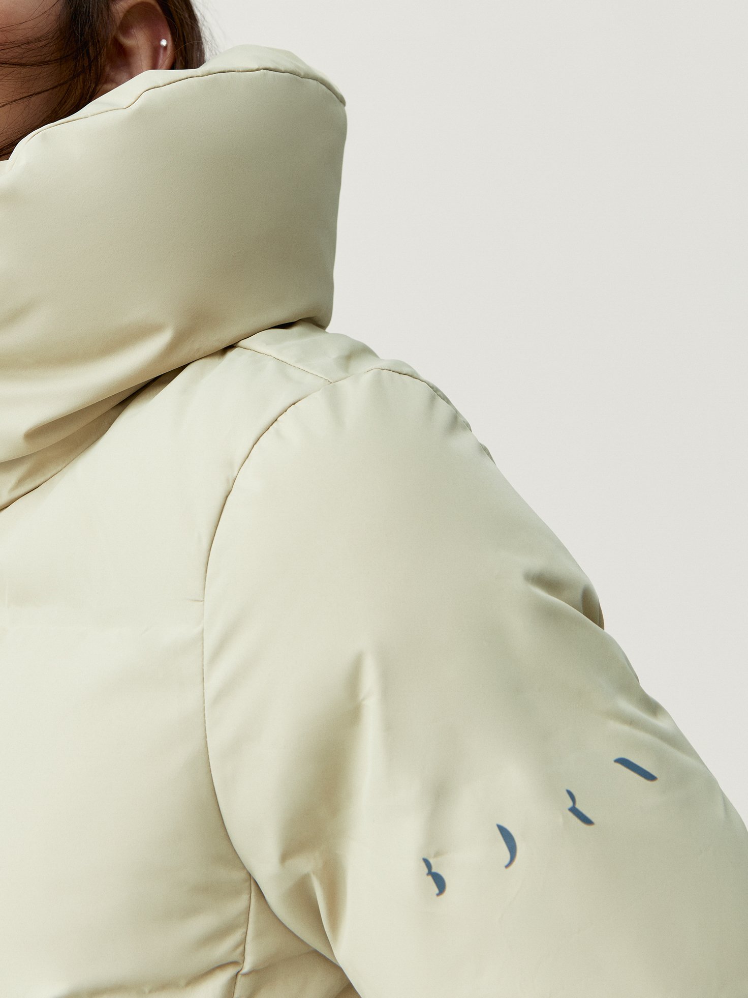 Padded waterproof winter coat BORN LIVING YOGA Beige