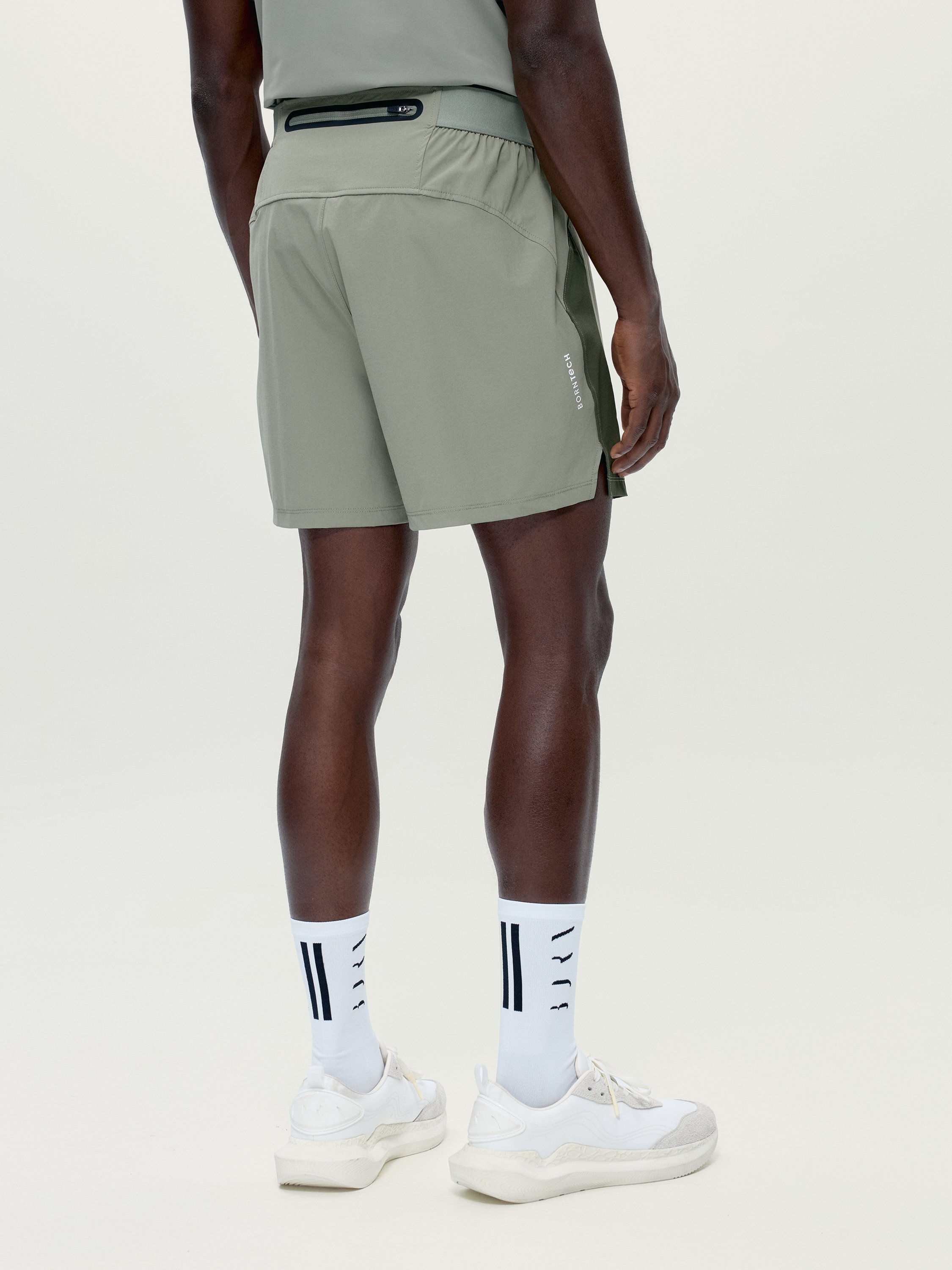 Men's sports shorts with zip pockets BORN Green