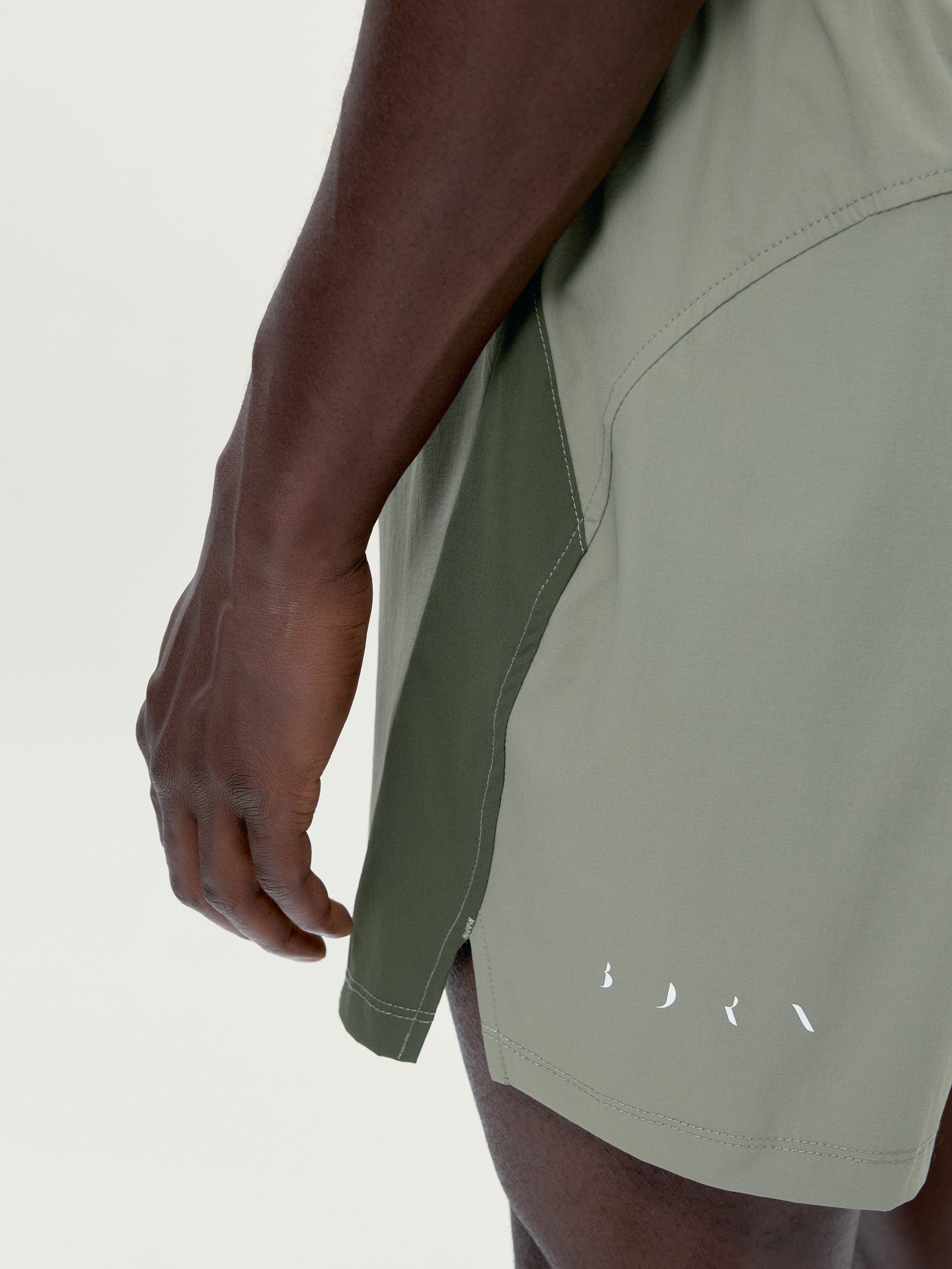 Men's sports shorts with zip pockets BORN Green
