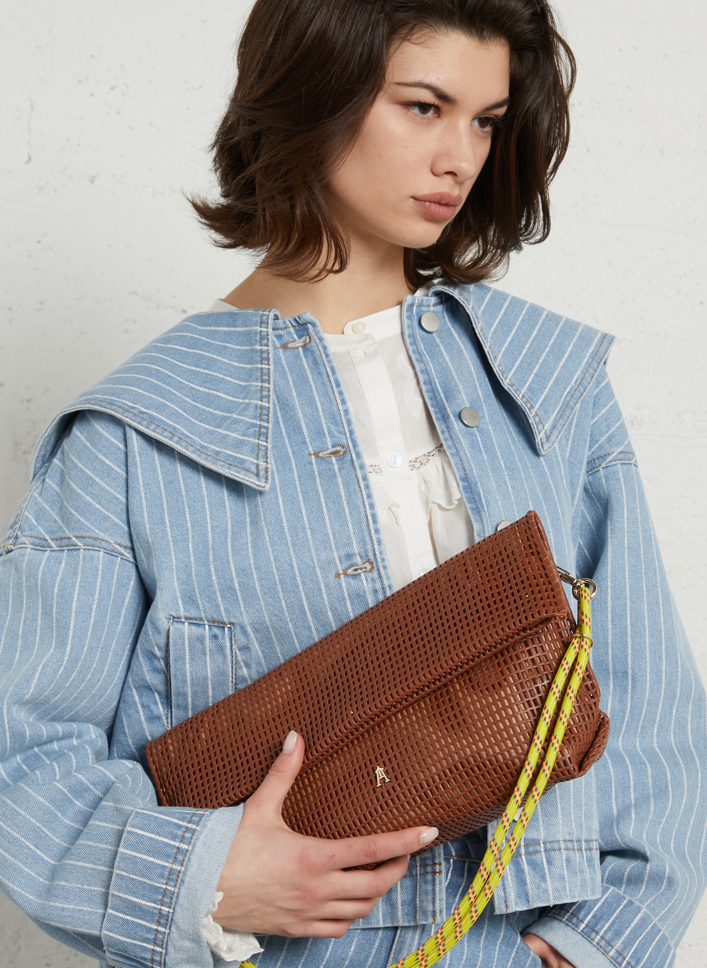 Perforated leather crossbody bag CRAIE STUDIO Brown