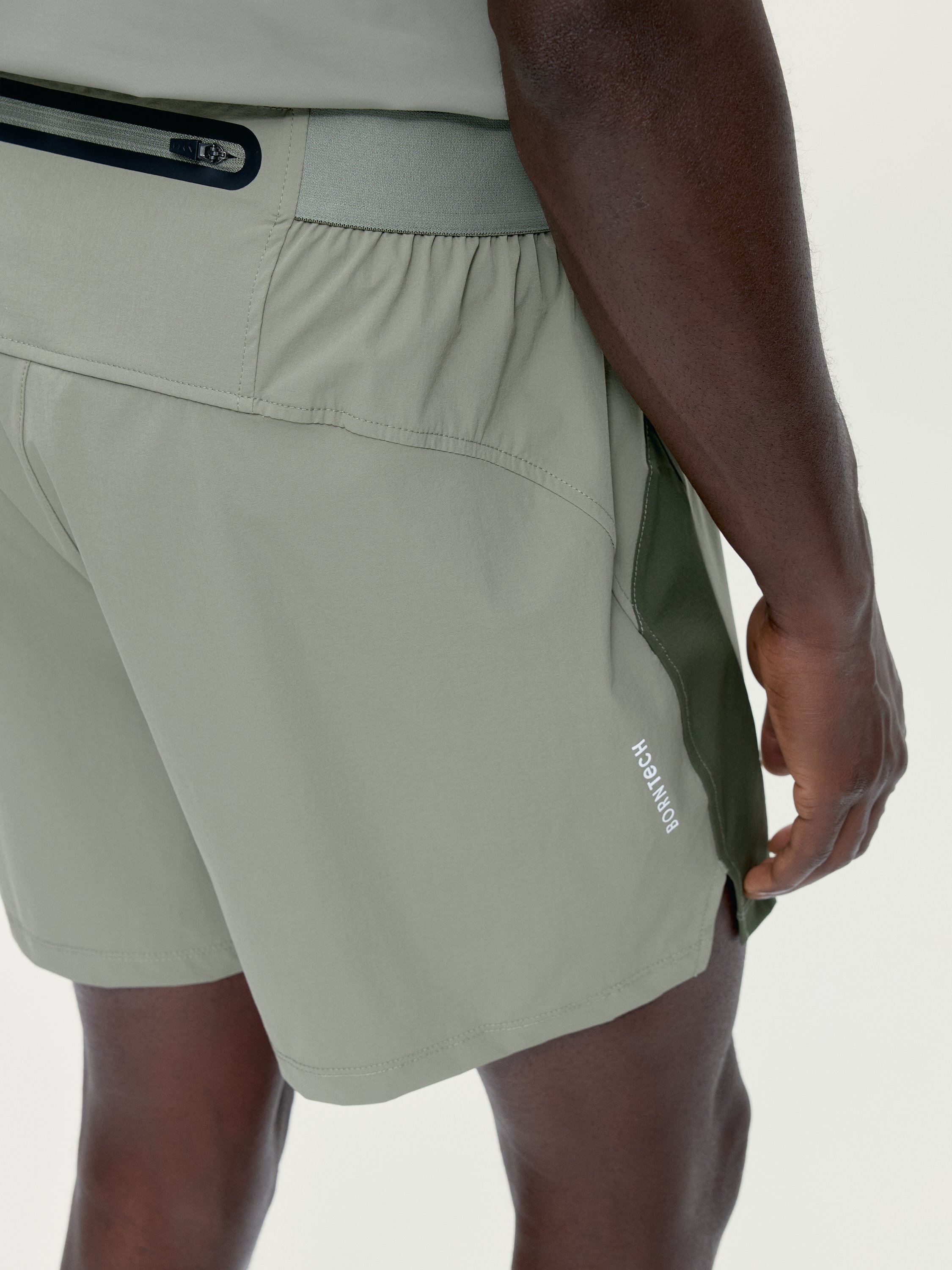 Men's sports shorts with zip pockets BORN Green