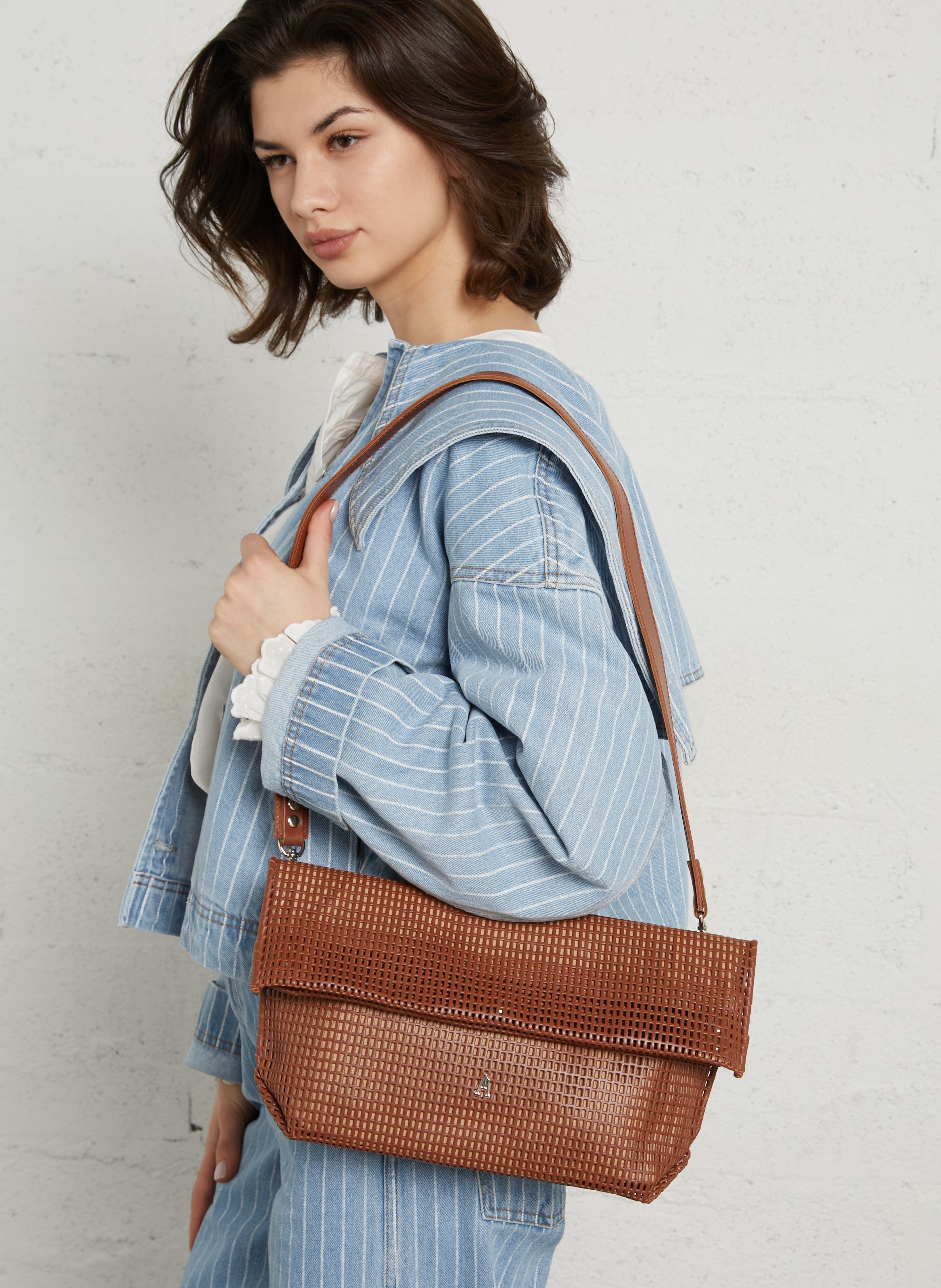 Perforated leather crossbody bag CRAIE STUDIO Brown