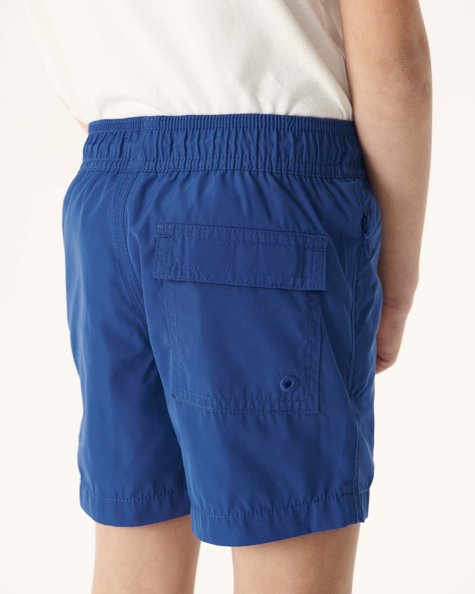 Child swim shorts in blackcurrant JOTT Blue