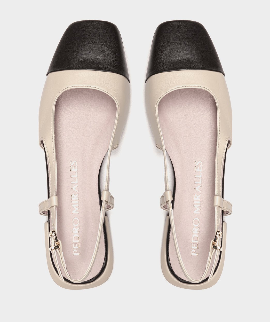 Beige leather cut-out ballerina flats with black toe. PEDRO MIRALLES Beige