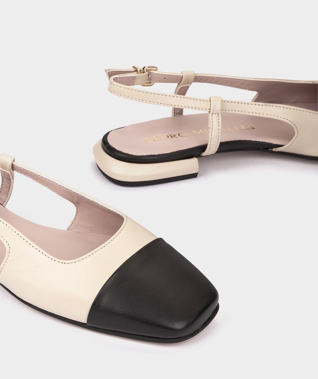 Beige leather cut-out ballerina flats with black toe. PEDRO MIRALLES Beige