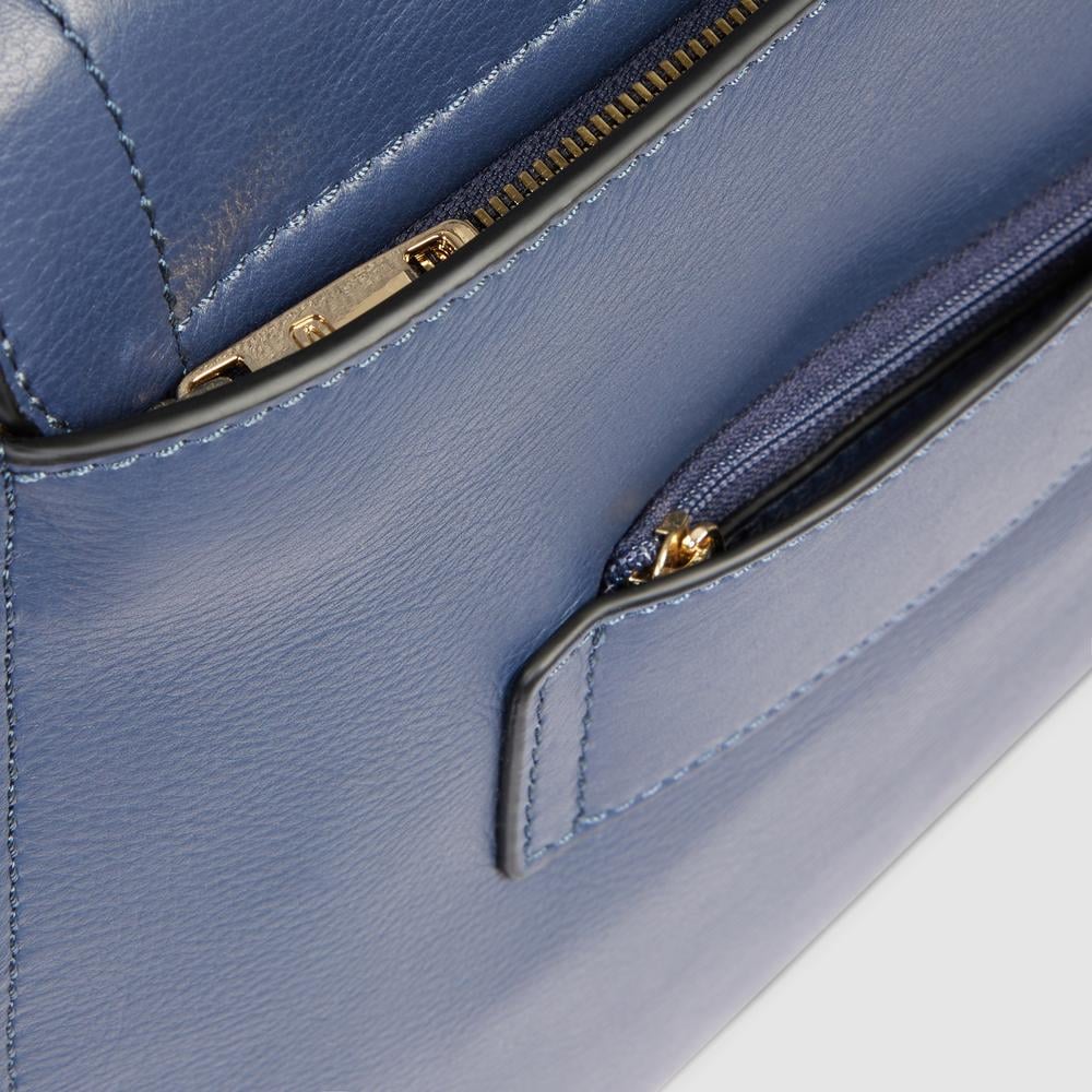 Women's leather satchel bag with laptop compartment, shockproof protection, and RFID shielding PIQUADRO Blue