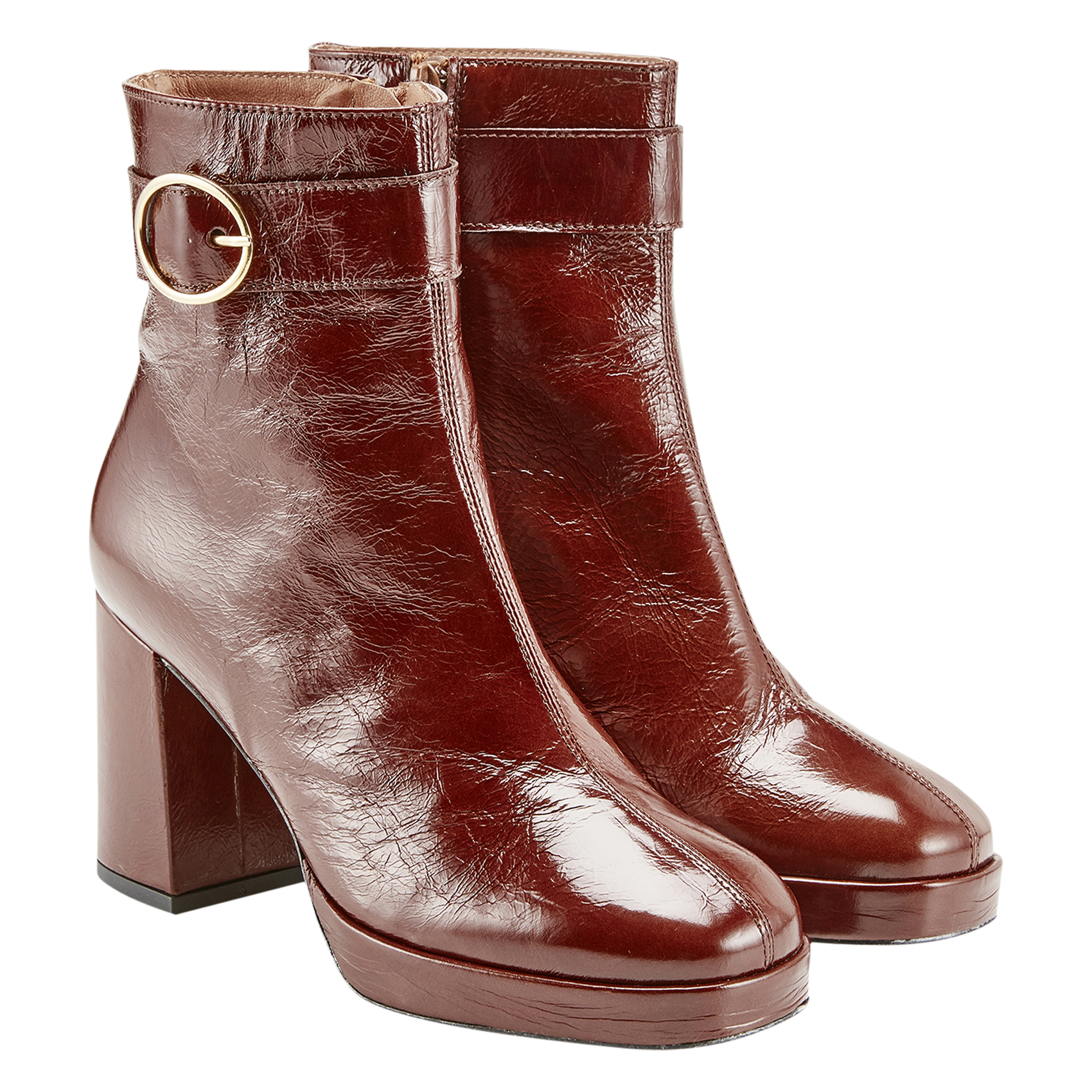 - 100% leather, - Round toes, - Inner zip fastening, - Heel height: 9 cm. COSMOPARIS Brown