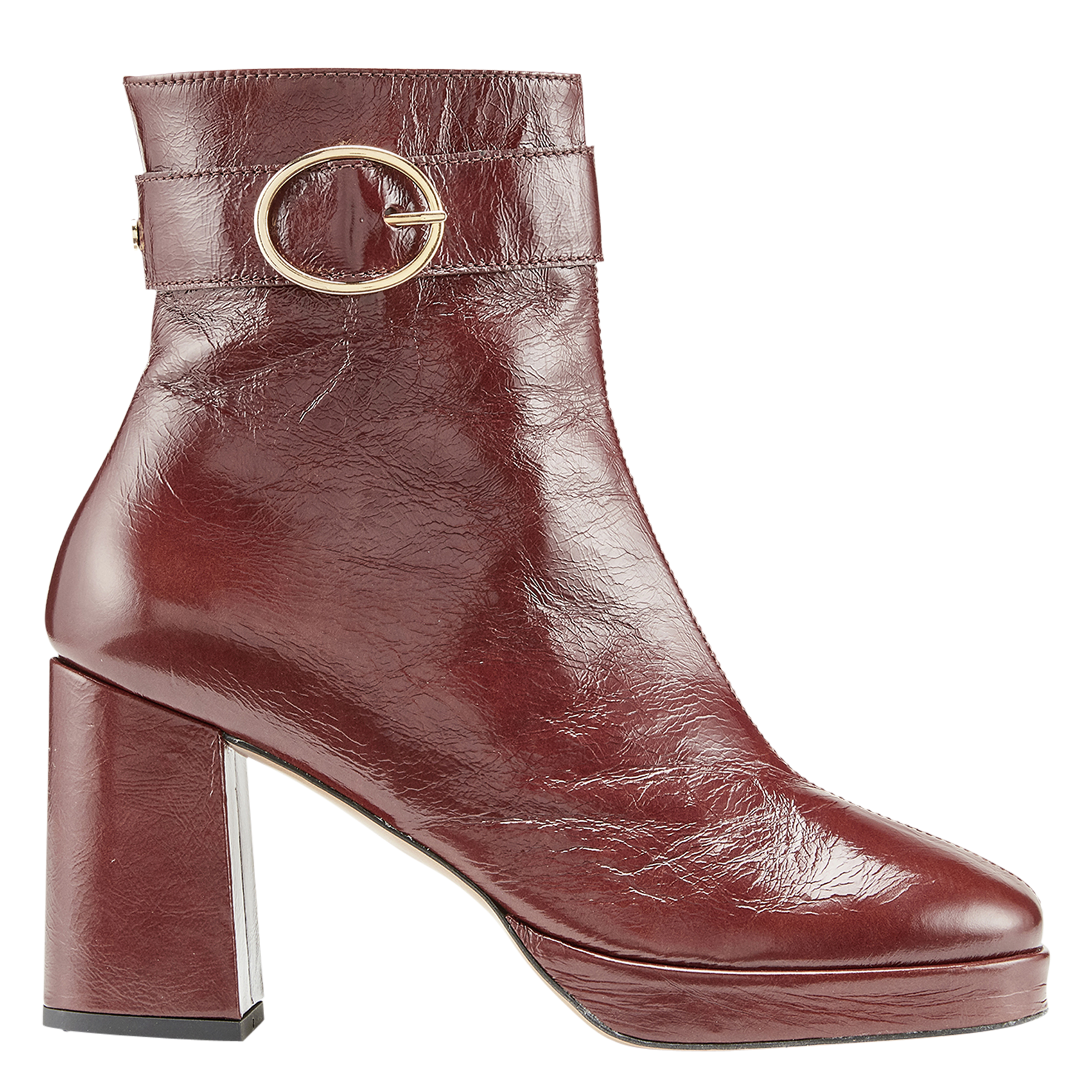 - 100% leather, - Round toes, - Inner zip fastening, - Heel height: 9 cm. COSMOPARIS Brown