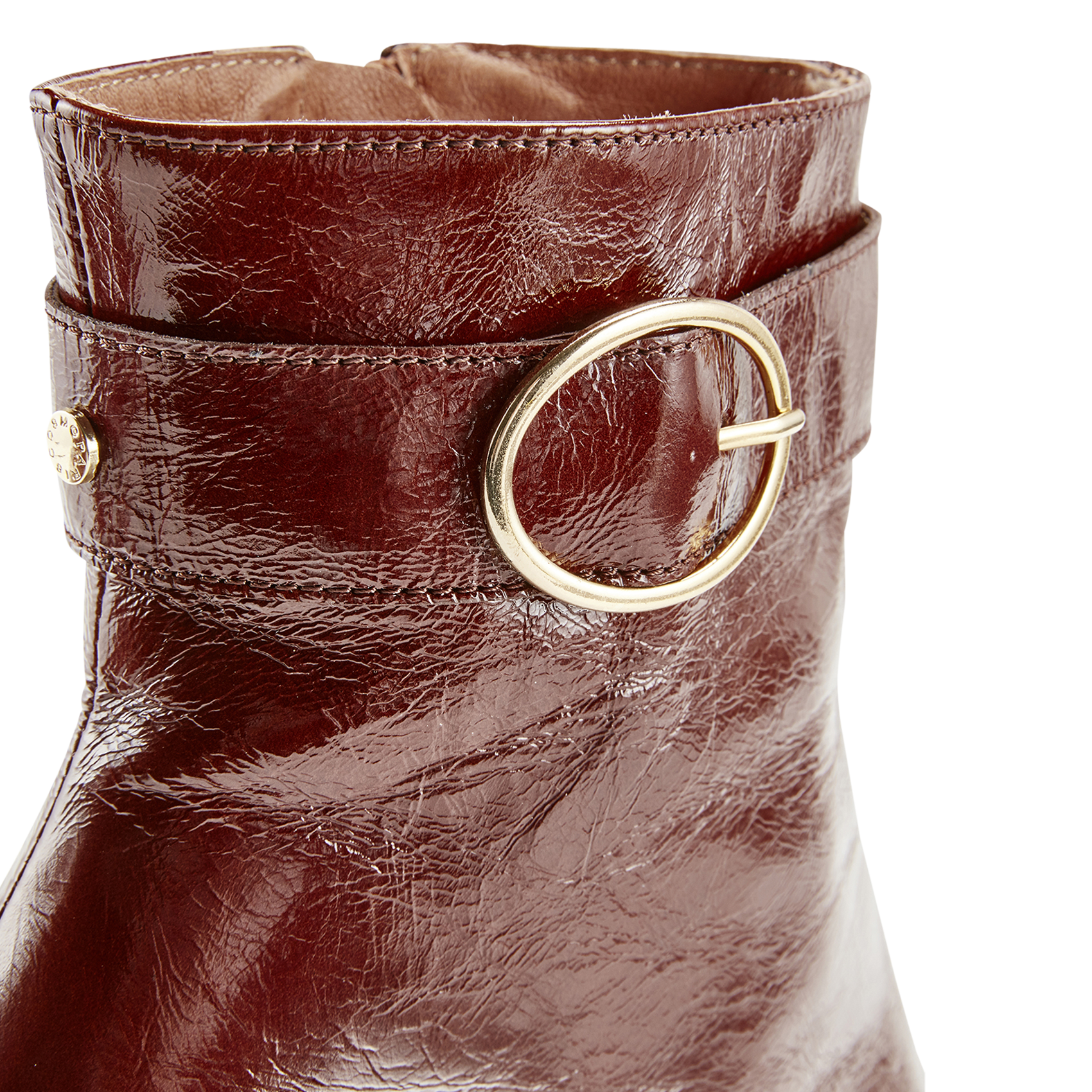 - 100% leather, - Round toes, - Inner zip fastening, - Heel height: 9 cm. COSMOPARIS Brown