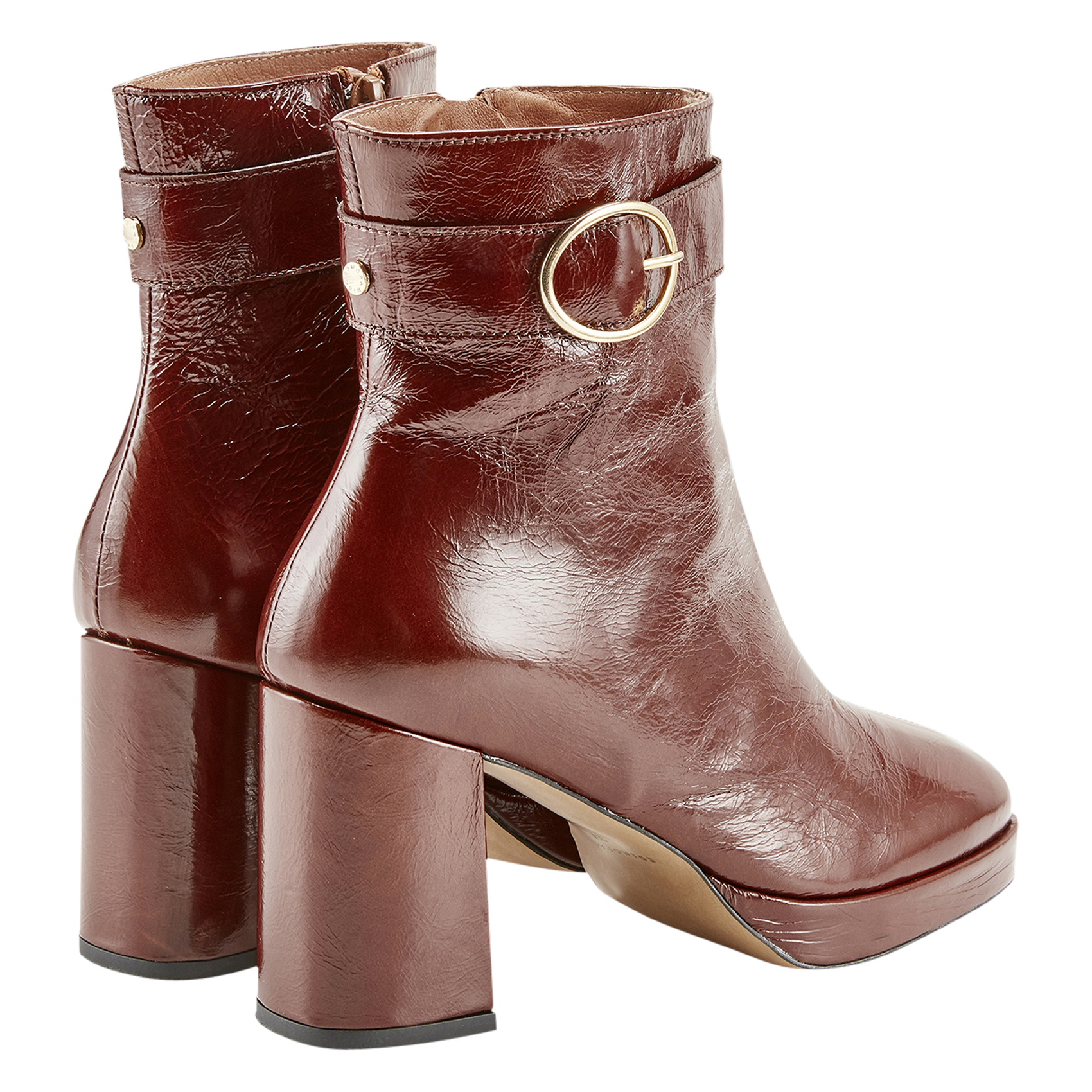 - 100% leather, - Round toes, - Inner zip fastening, - Heel height: 9 cm. COSMOPARIS Brown