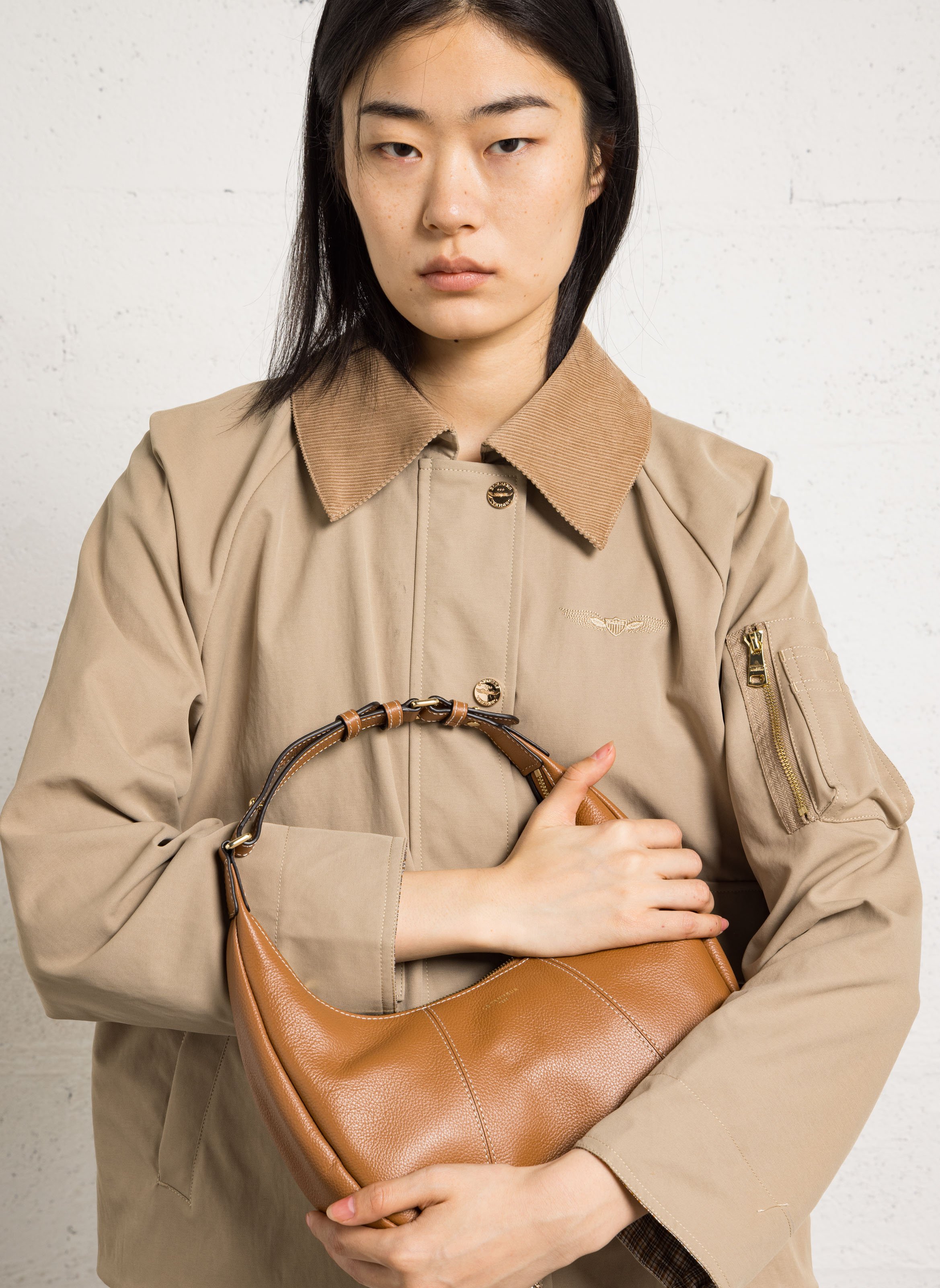 Small zippered hobo bag in grained leather LE TANNEUR Brown