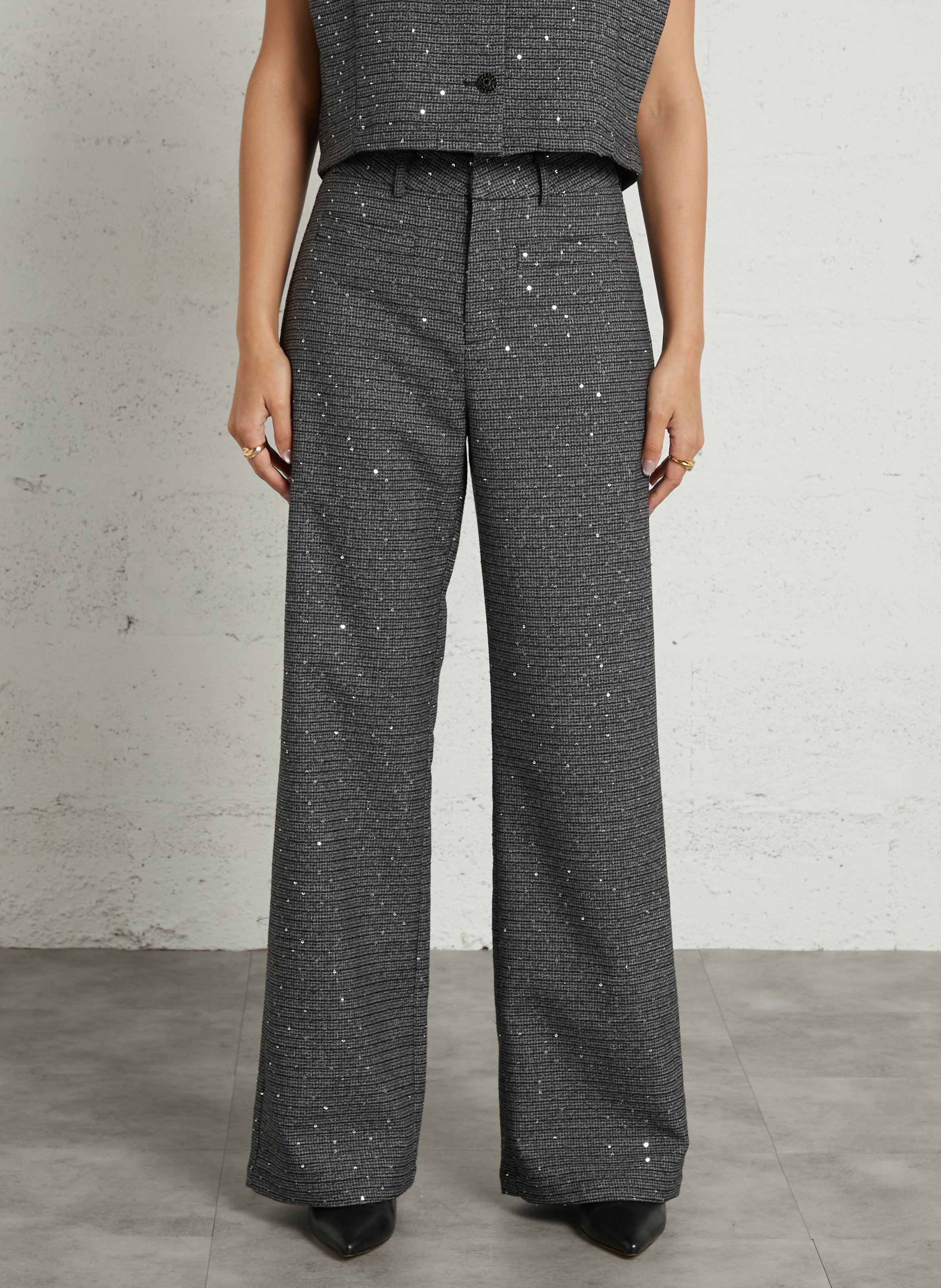 Flared sequin pants. SUNCOO