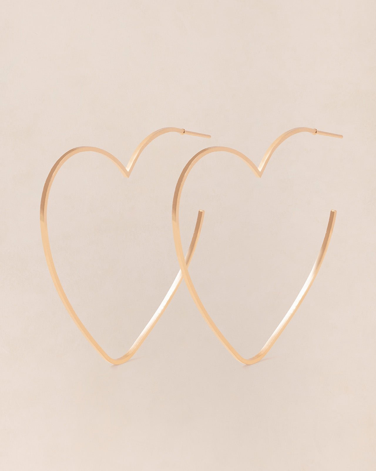 Heart-shaped golden hoop earrings EMOI EMOI Golden