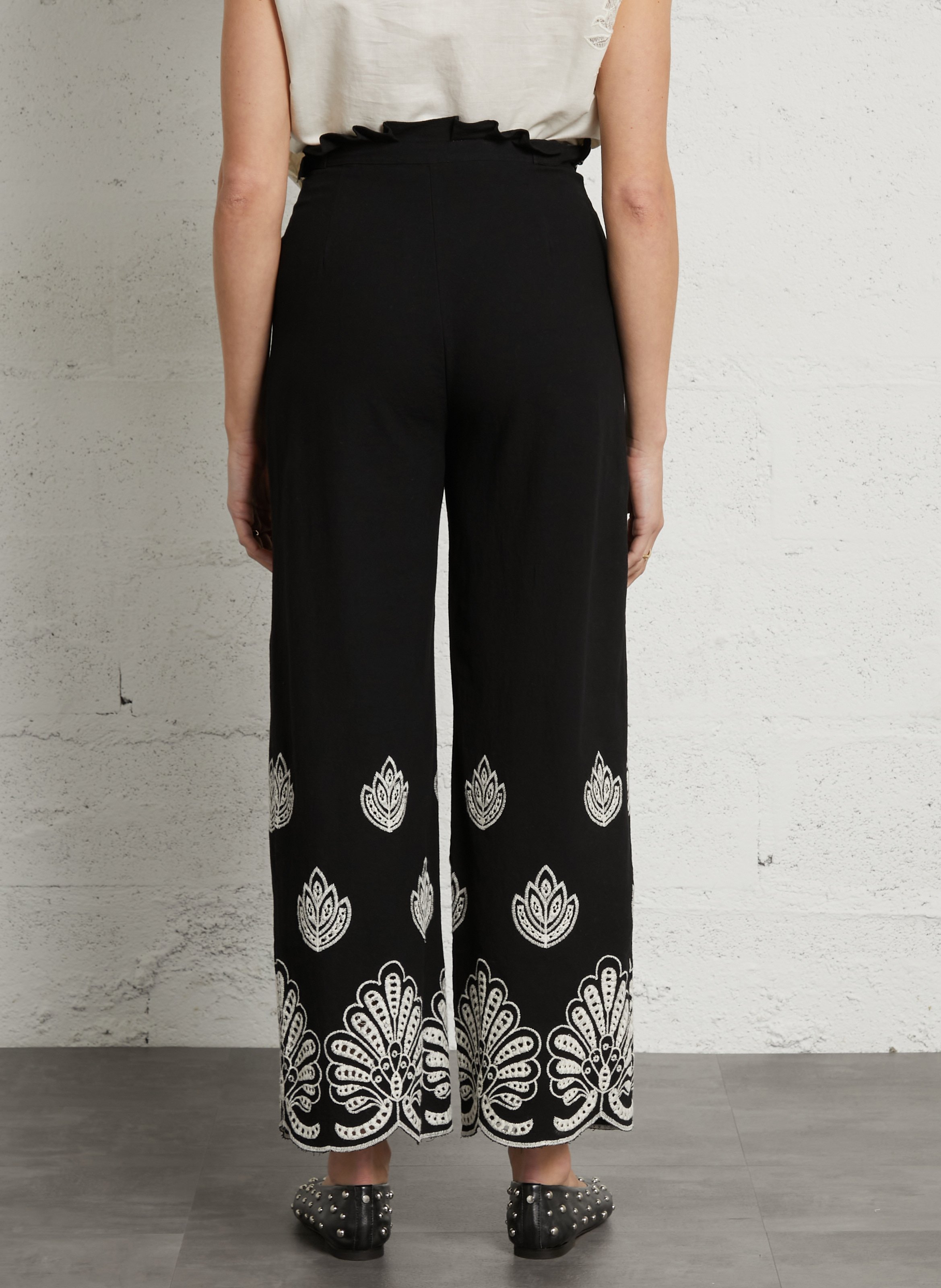 Wide leg 7/8th embroidered pants. THE KORNER Black