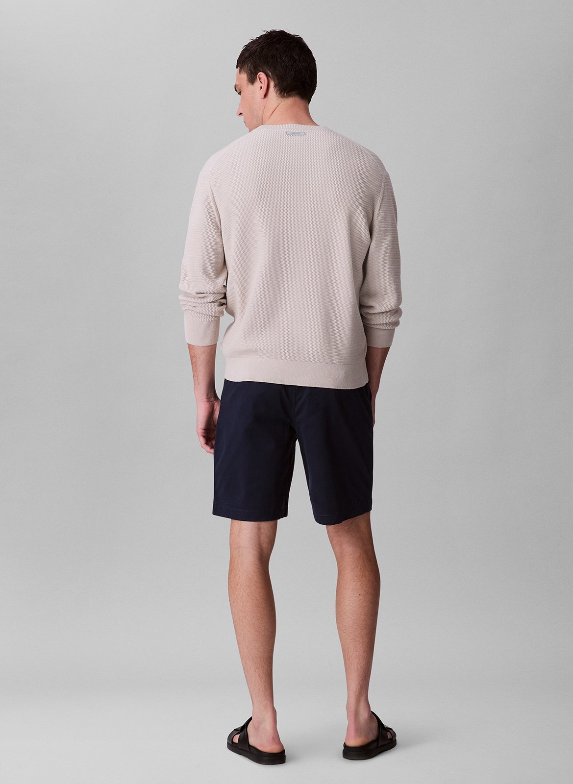 Short solid color chino in blended cotton. CALVIN KLEIN Blue