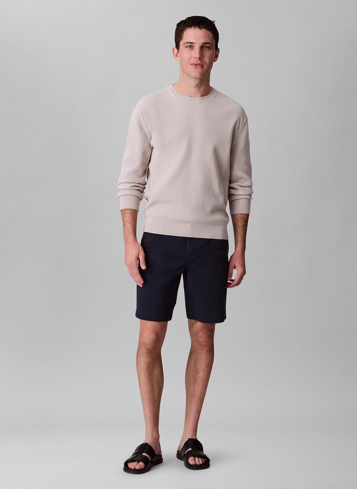 Short solid color chino in blended cotton. CALVIN KLEIN Blue