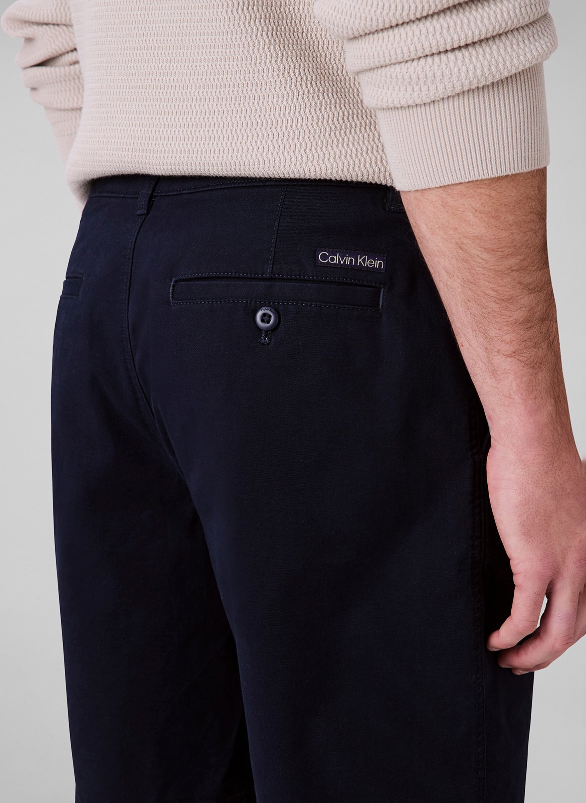 Short solid color chino in blended cotton. CALVIN KLEIN Blue