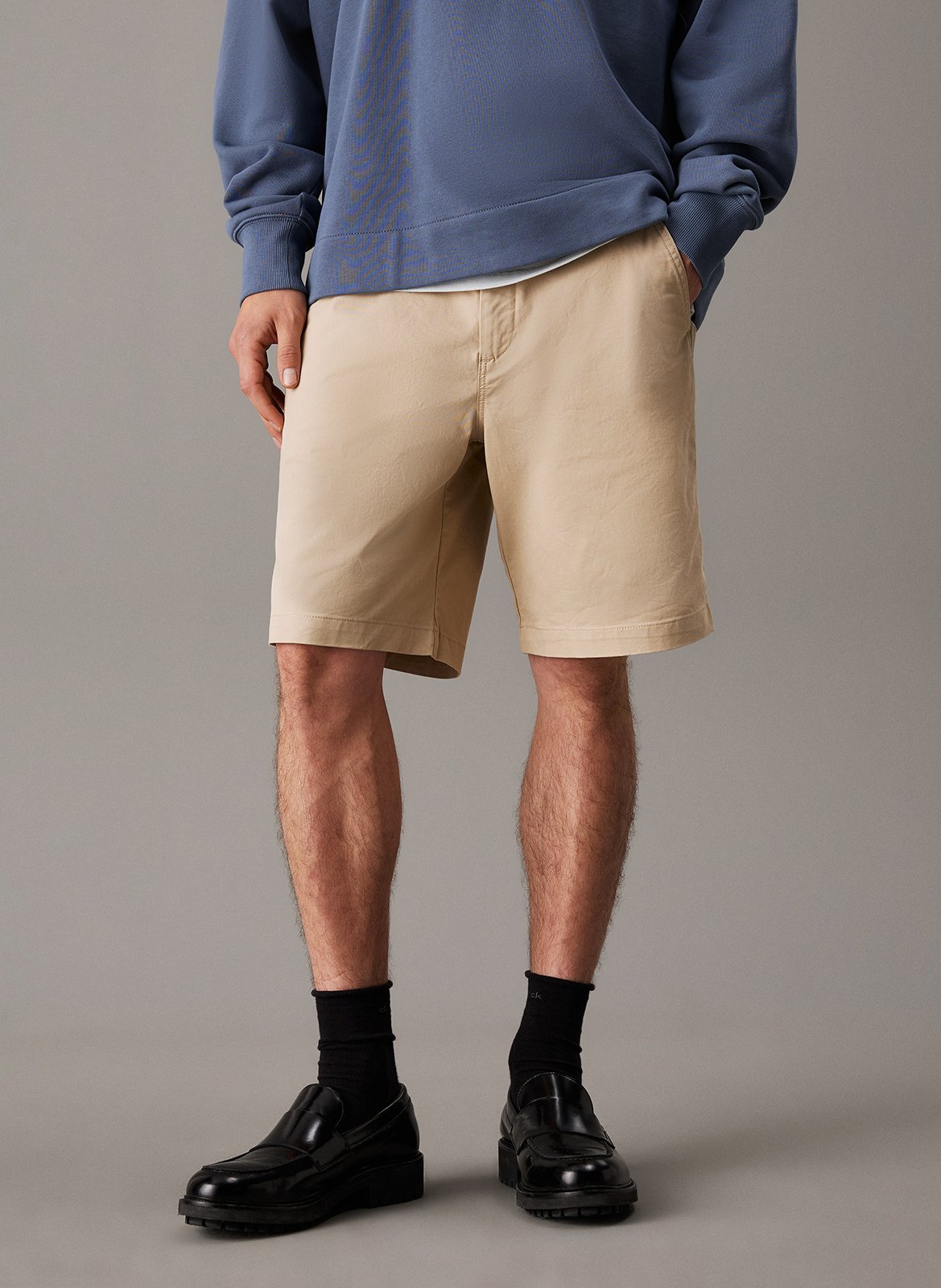 Short solid color chino in blended cotton. CALVIN KLEIN Beige
