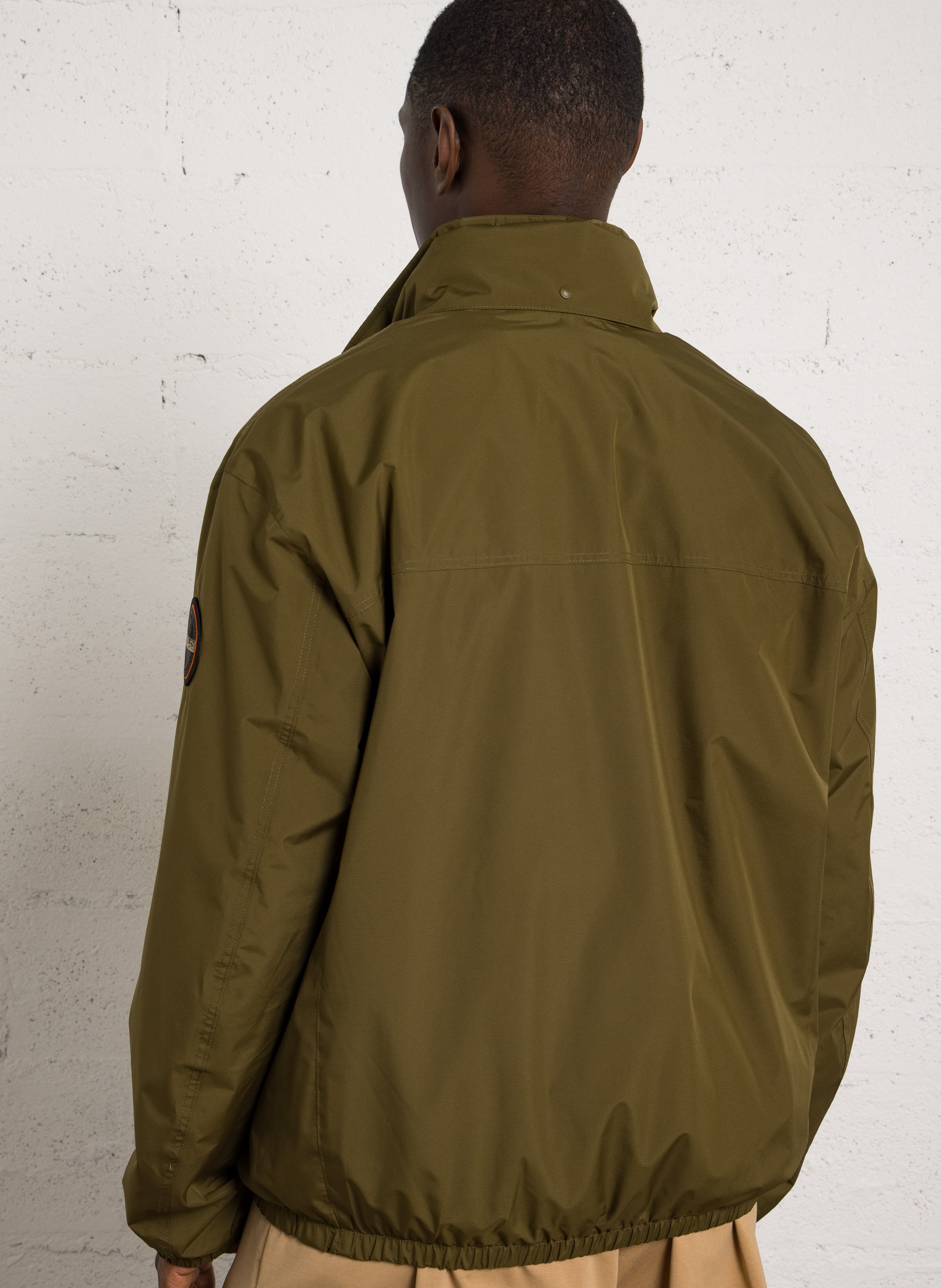 Buttoned and zipped high-neck fitted raincoat NAPAPIJRI Green