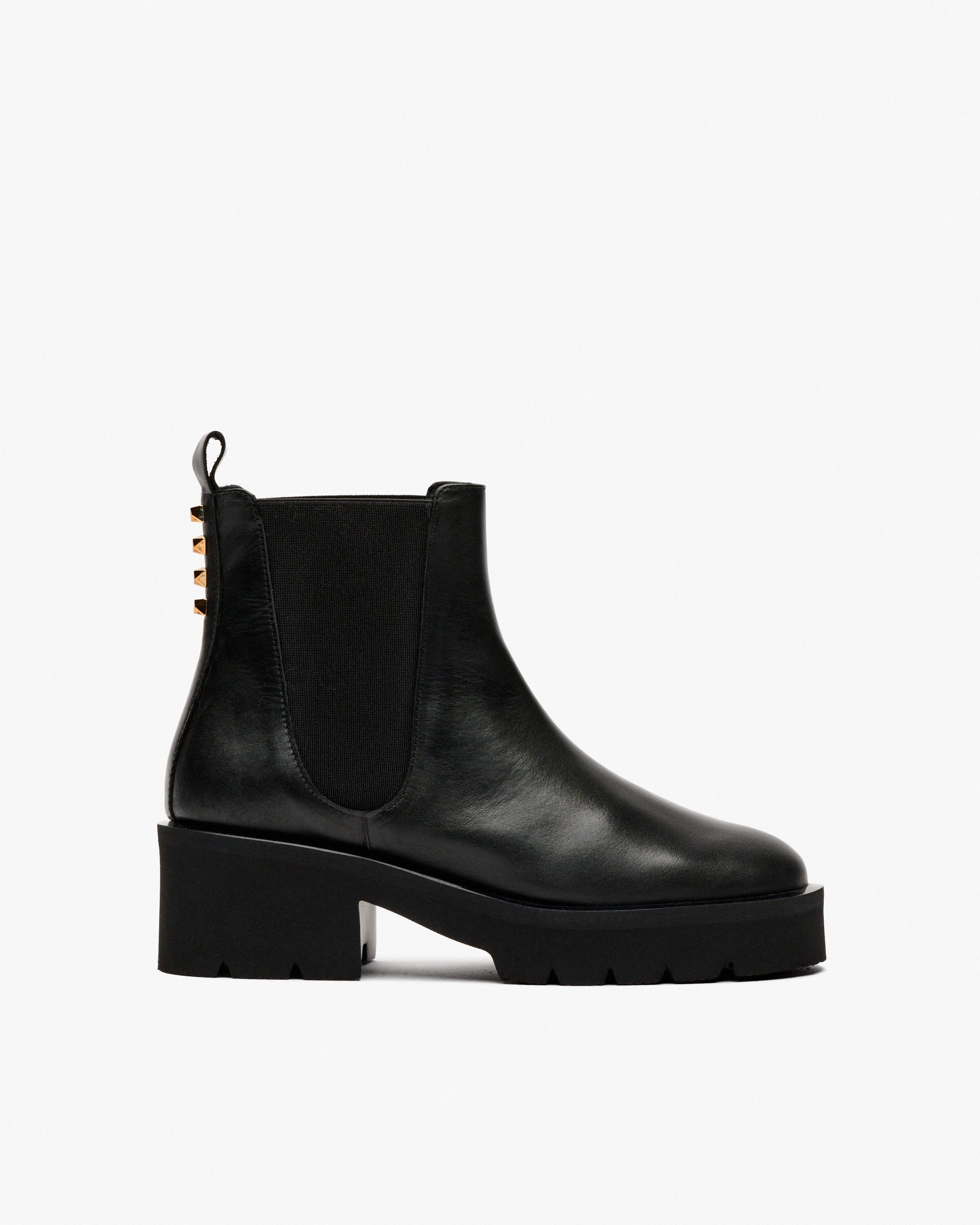 Black leather ankle boots with side elastic. PEDRO MIRALLES Black