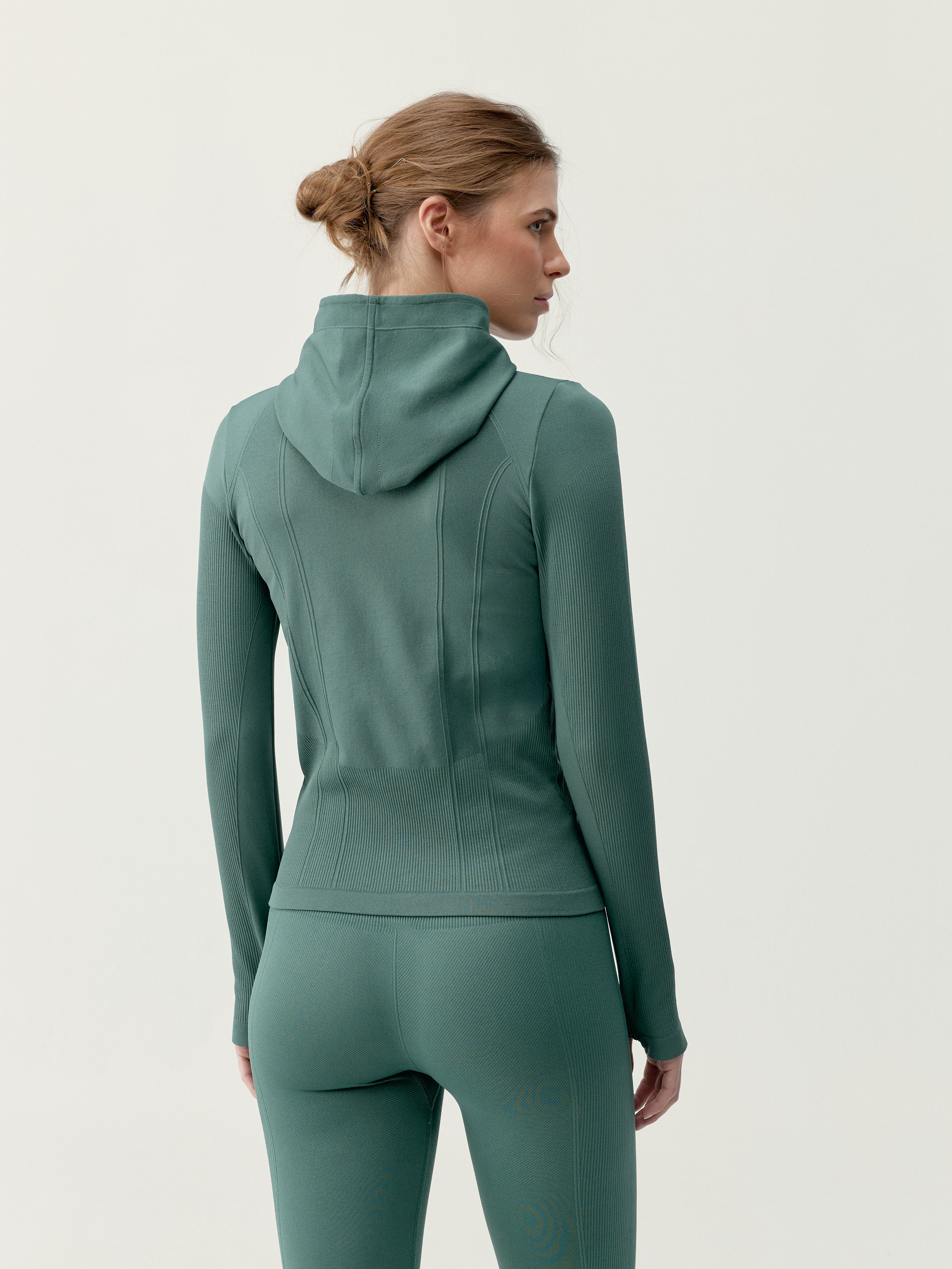 Women's sport jacket with hood and shaping effect BORN Green