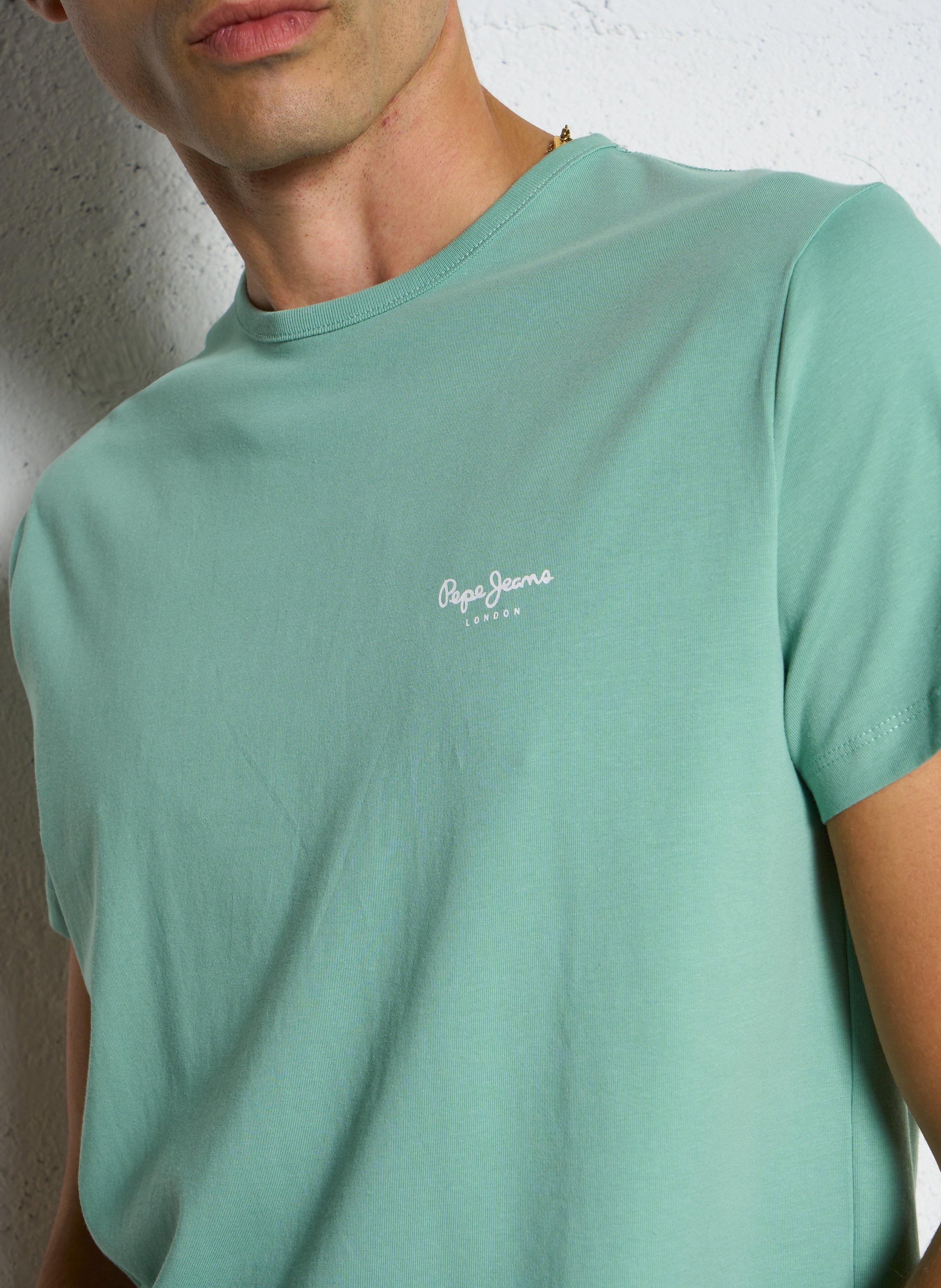 Solid straight t-shirt with chest logo. PEPE JEANS Green