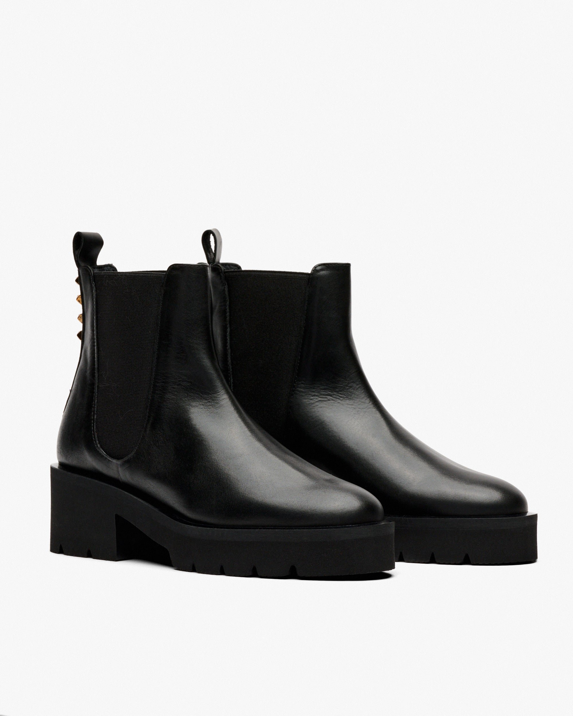Black leather ankle boots with side elastic. PEDRO MIRALLES Black