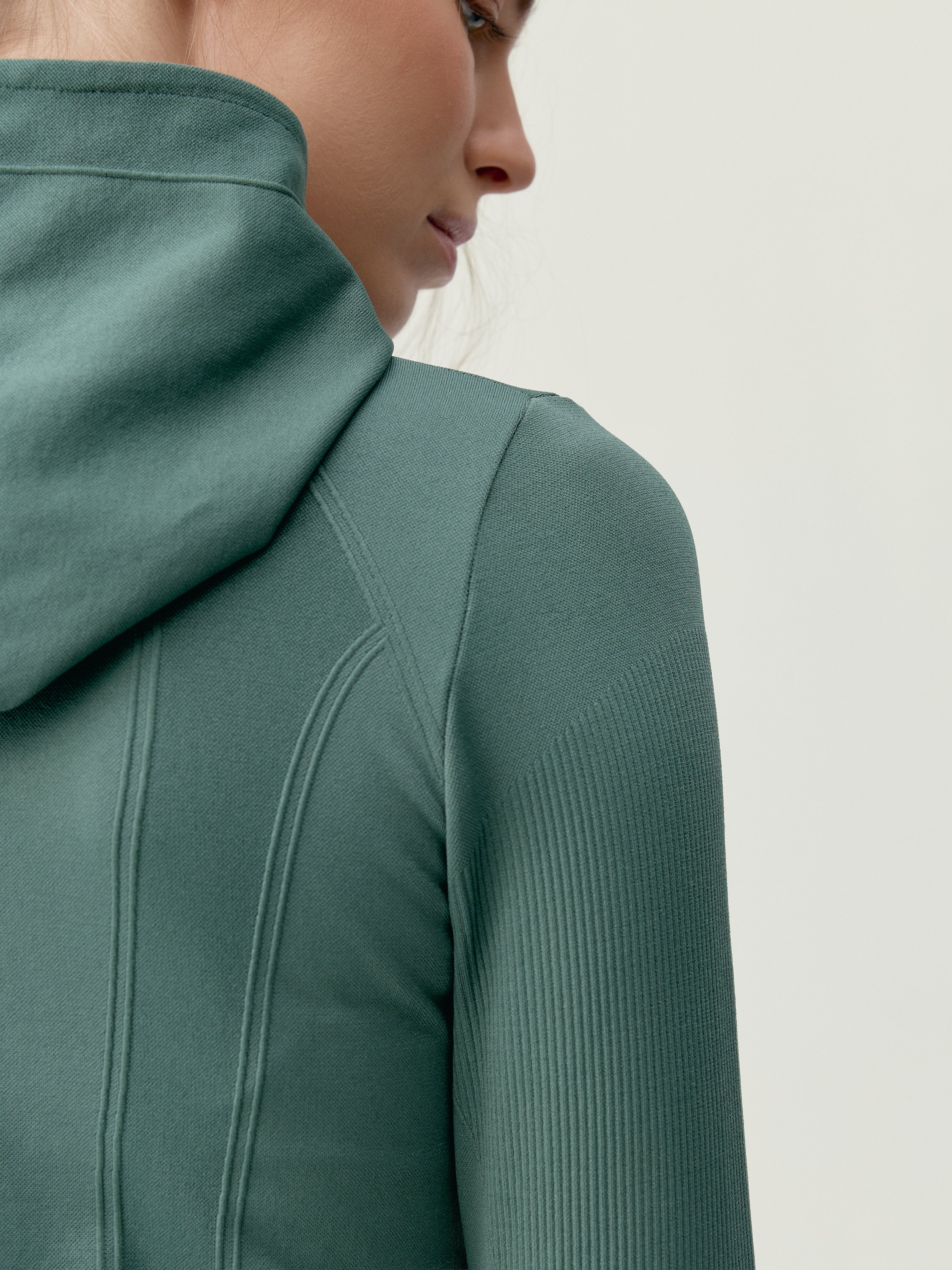 Women's sport jacket with hood and shaping effect BORN Green