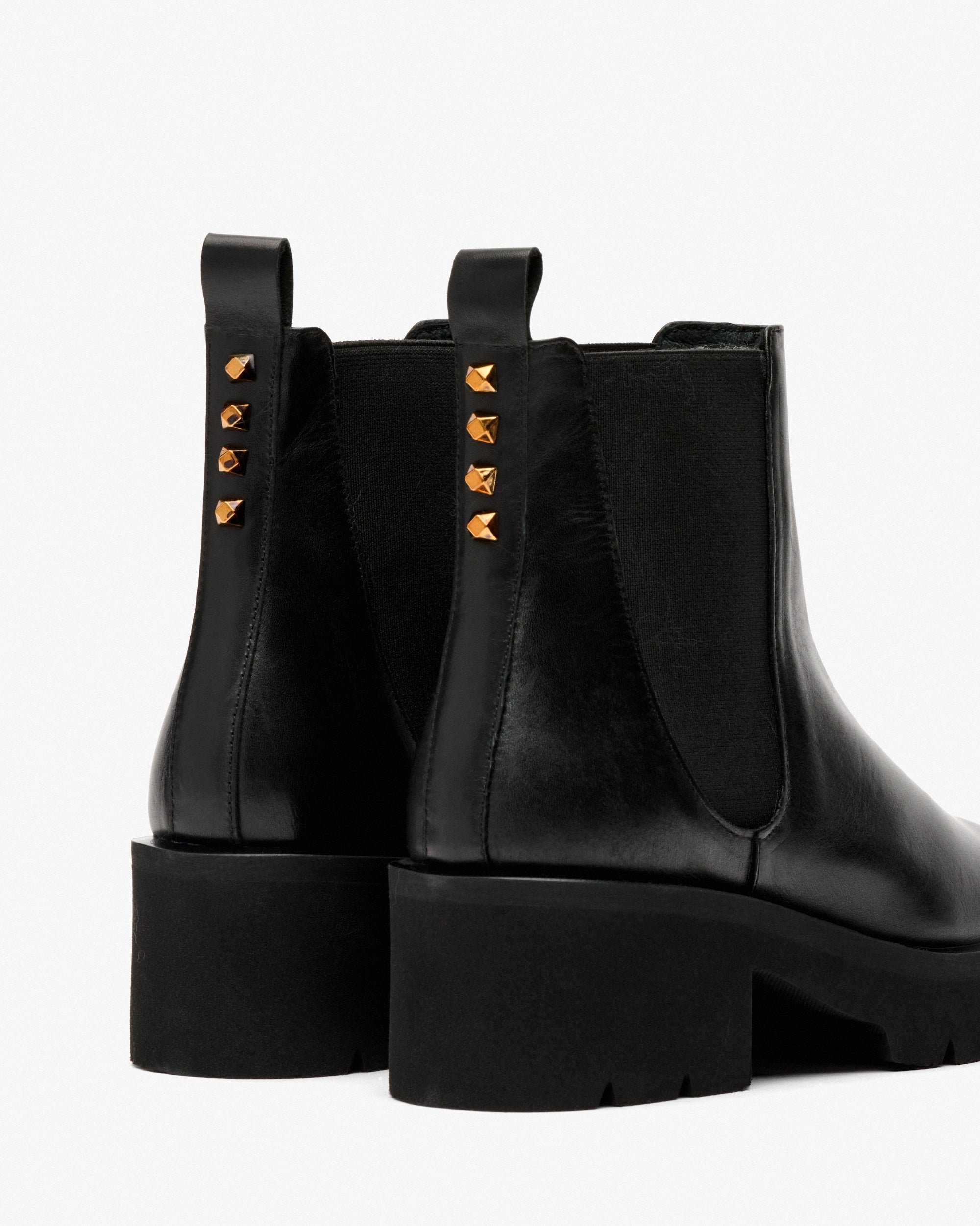 Black leather ankle boots with side elastic. PEDRO MIRALLES Black