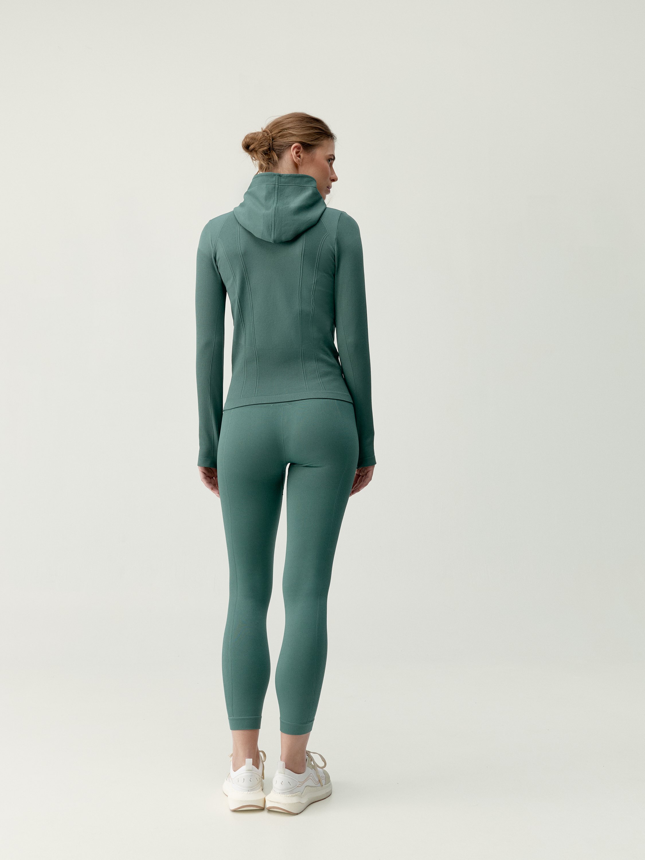 Women's sport jacket with hood and shaping effect BORN Green