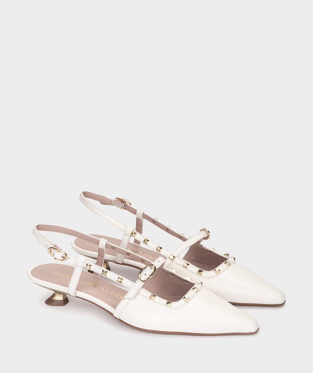 <p>High-heeled shoes, backless, in white leather.</p> PEDRO MIRALLES White