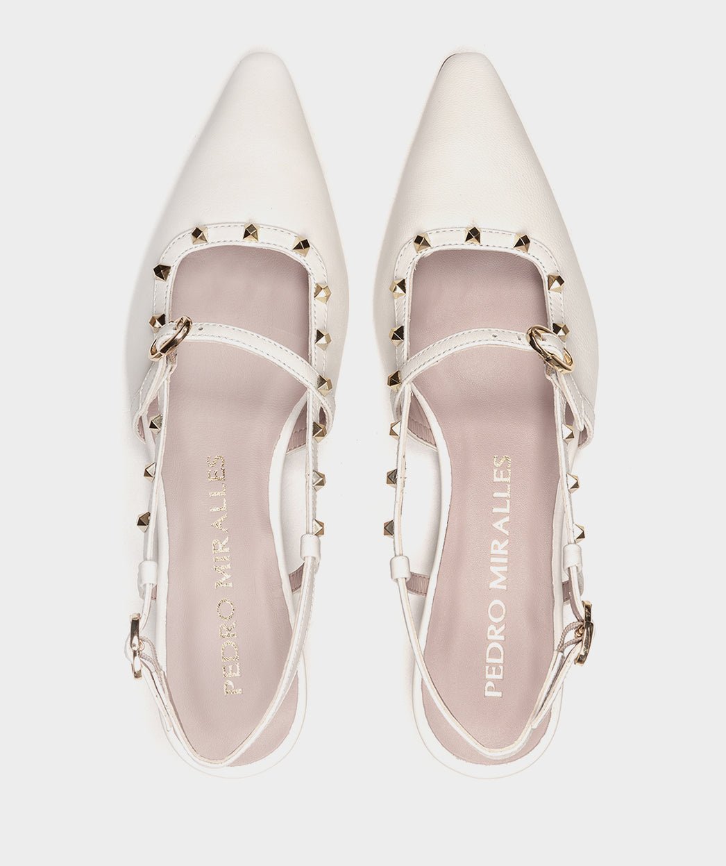 <p>High-heeled shoes, backless, in white leather.</p> PEDRO MIRALLES White