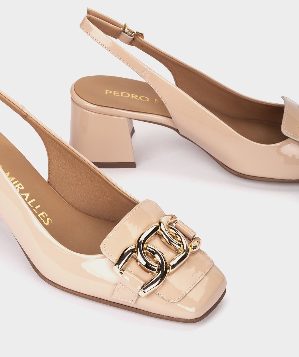 Peep-toe pumps in nude patent leather. PEDRO MIRALLES Pink