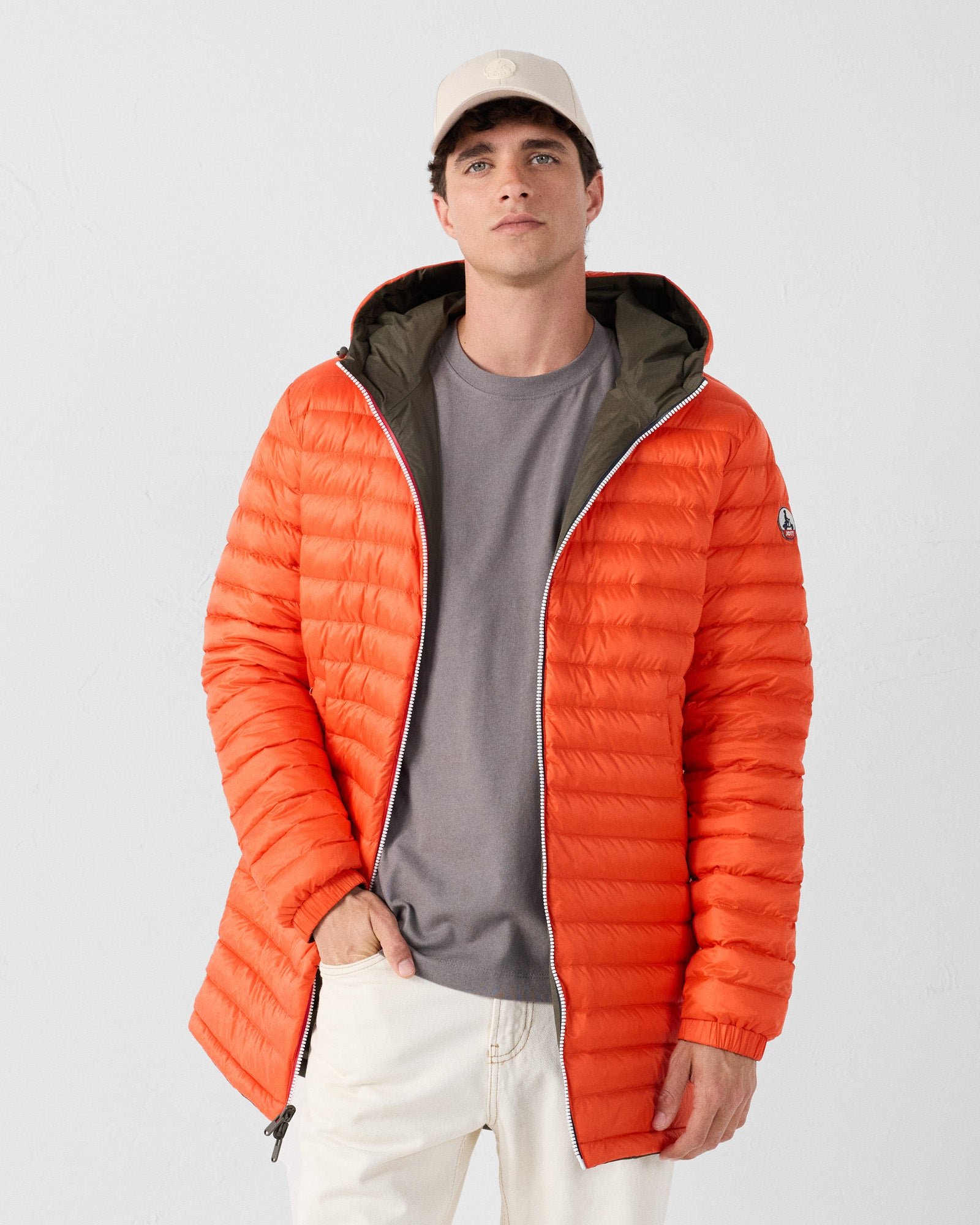 Reversible long jacket in army green/fire red. JOTT Green