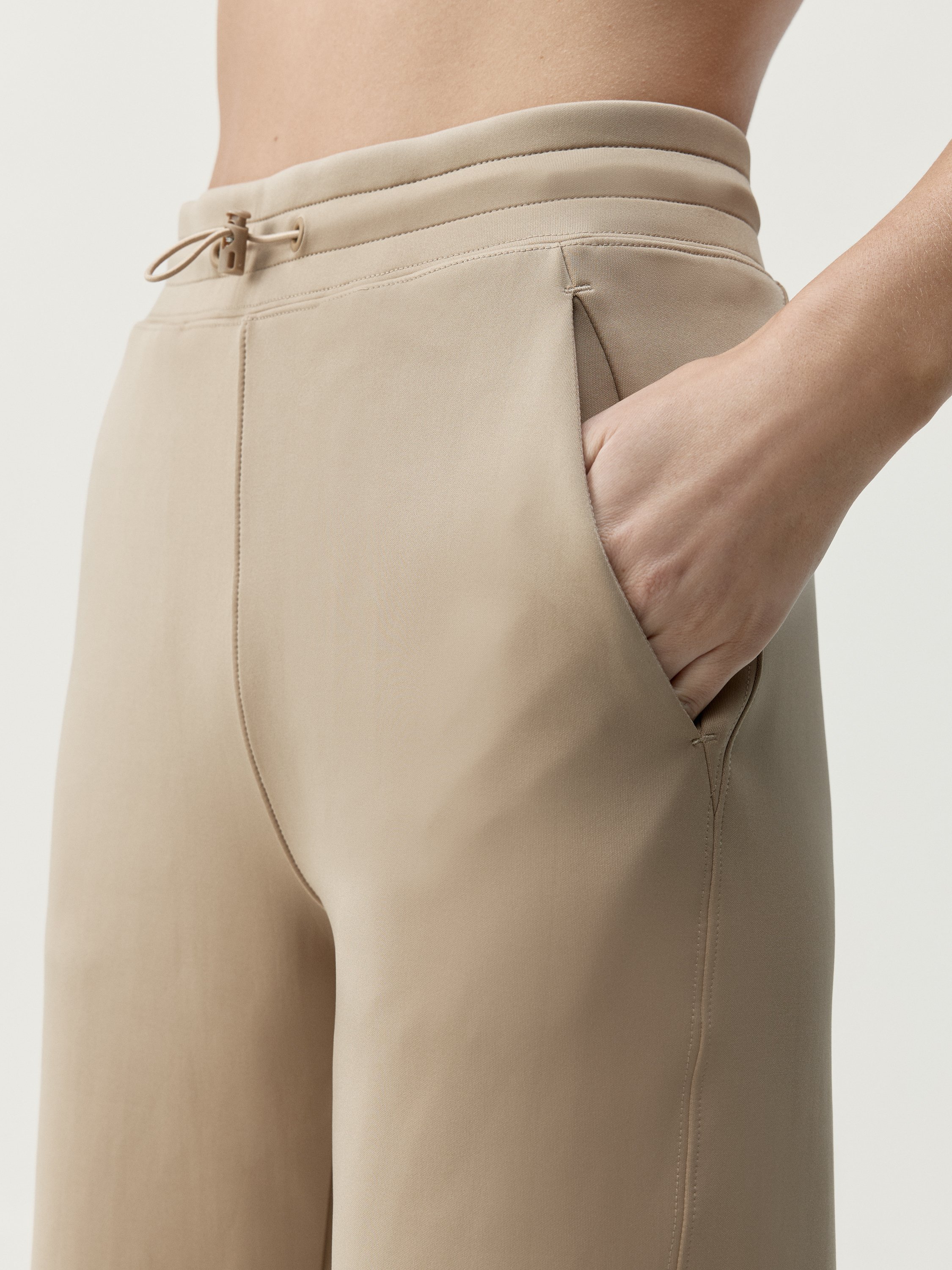 Comfortable sports pants BORN LIVING YOGA Beige