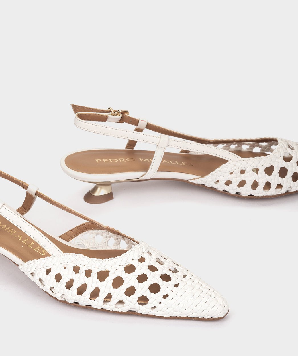 White woven shoes with pointed toe and open heel. PEDRO MIRALLES White