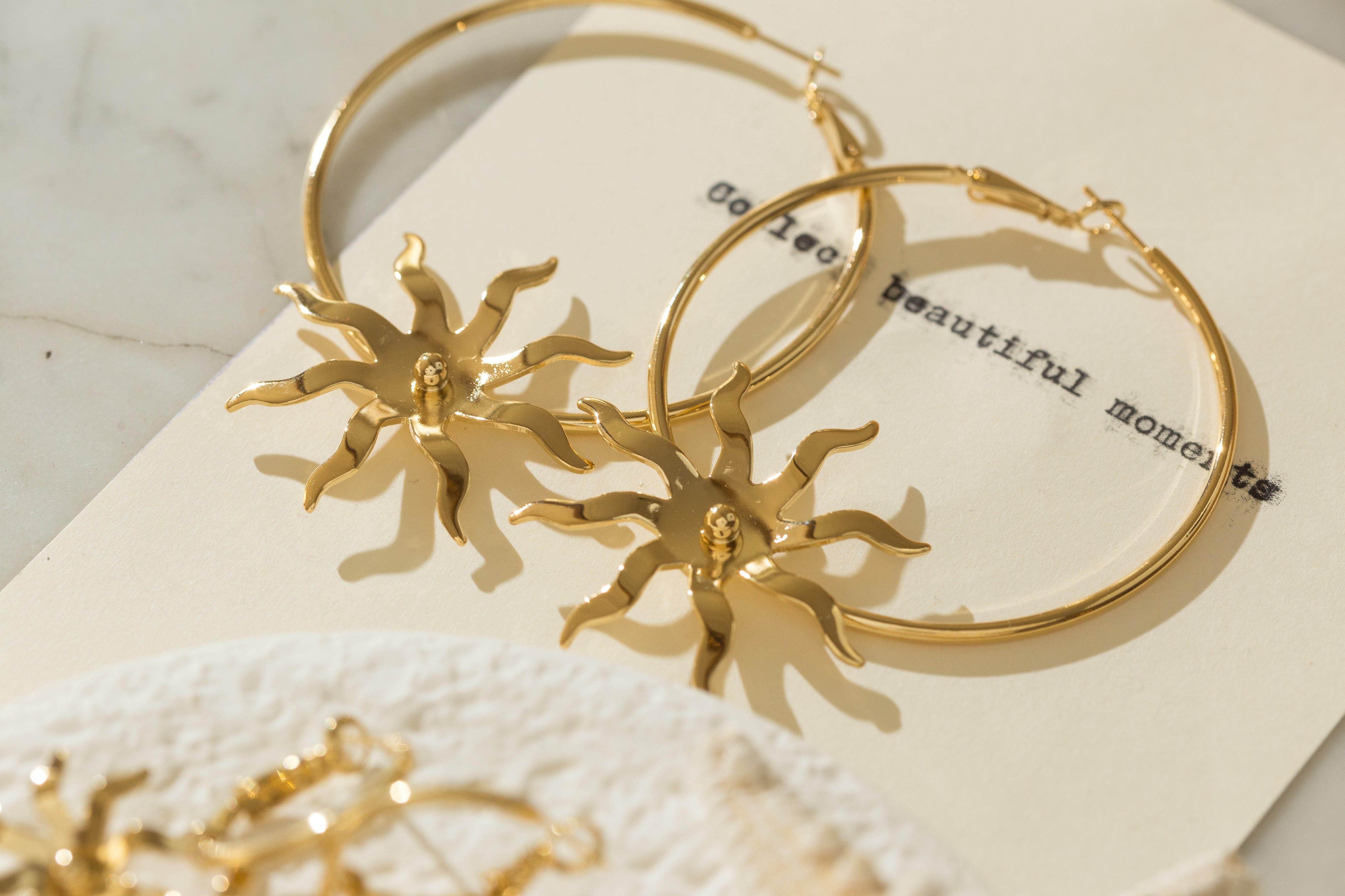 Sunburst silver-plated hoop earrings Golden