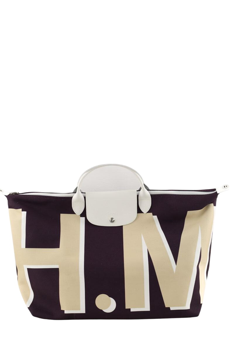 Grained faux leather travel bag LONGCHAMP - Seconde Main Purple