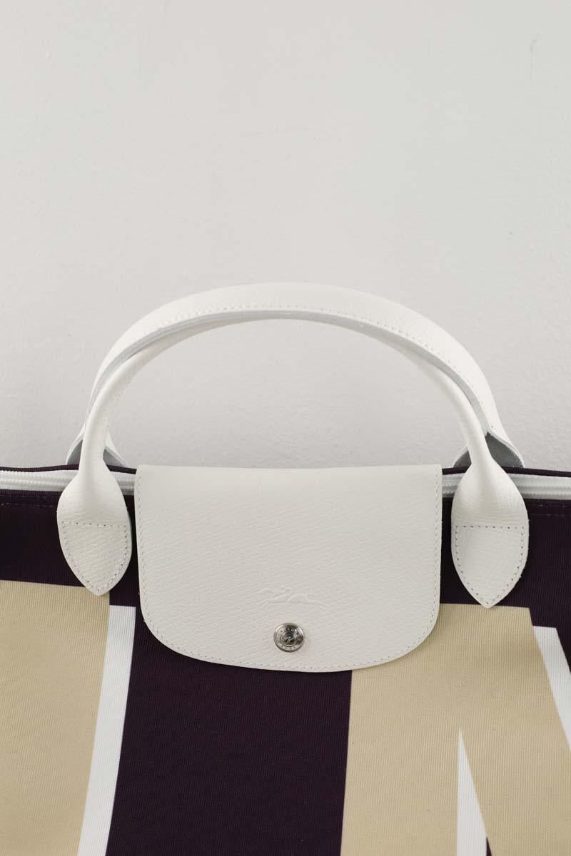 Grained faux leather travel bag LONGCHAMP - Seconde Main Purple