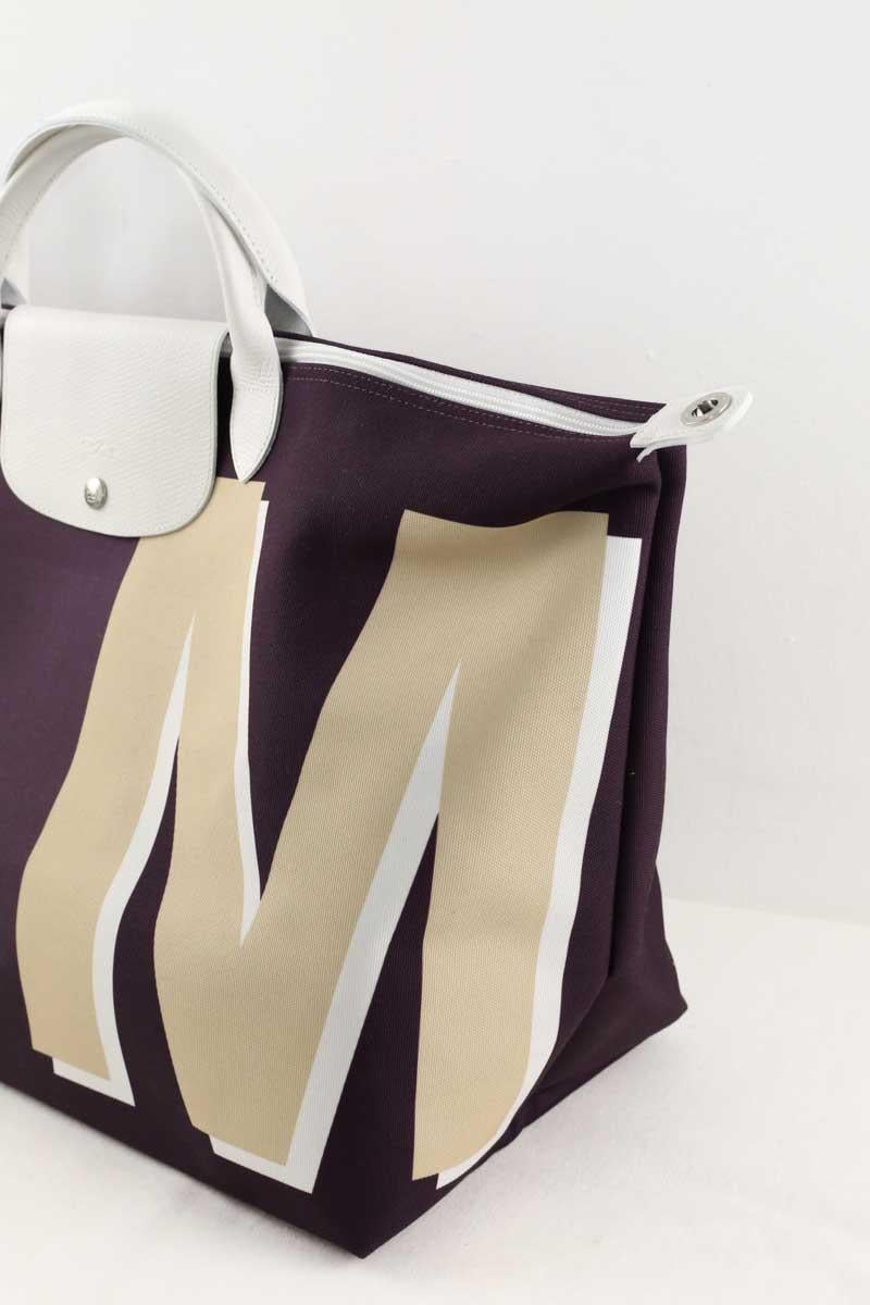 Grained faux leather travel bag LONGCHAMP - Seconde Main Purple