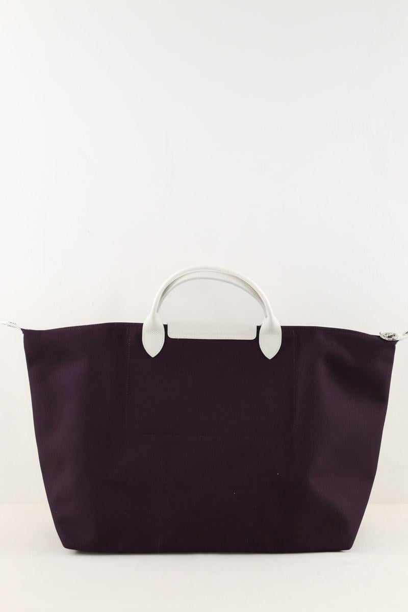 Grained faux leather travel bag LONGCHAMP - Seconde Main Purple