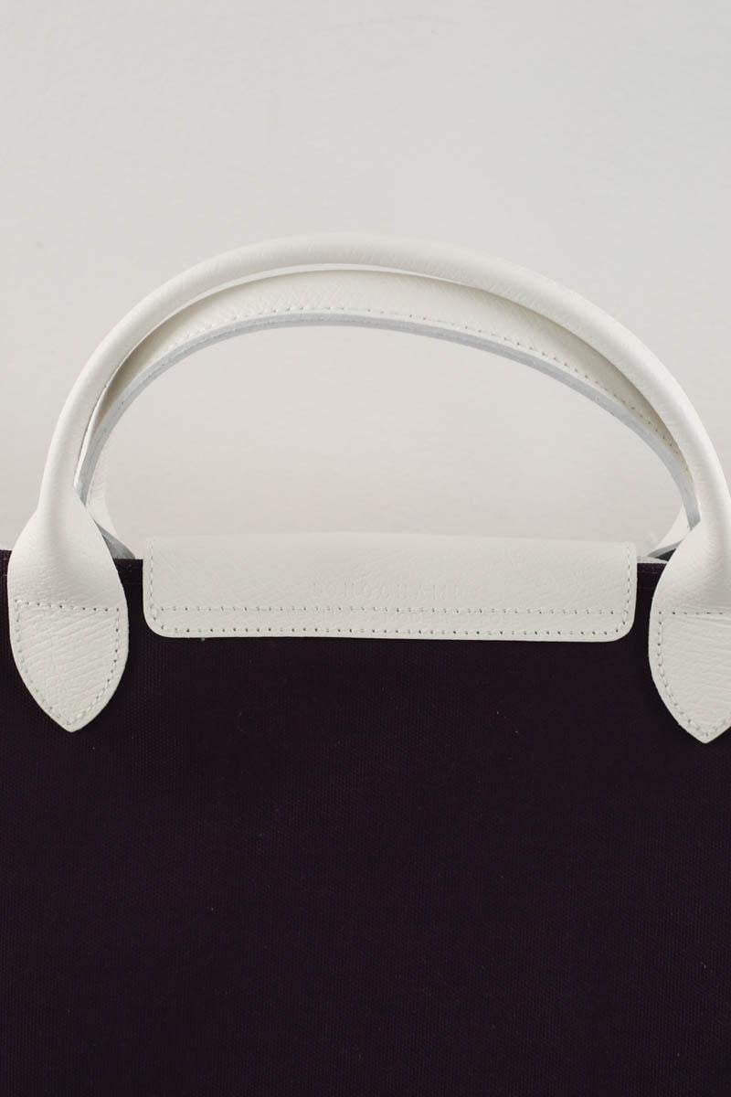 Grained faux leather travel bag LONGCHAMP - Seconde Main Purple