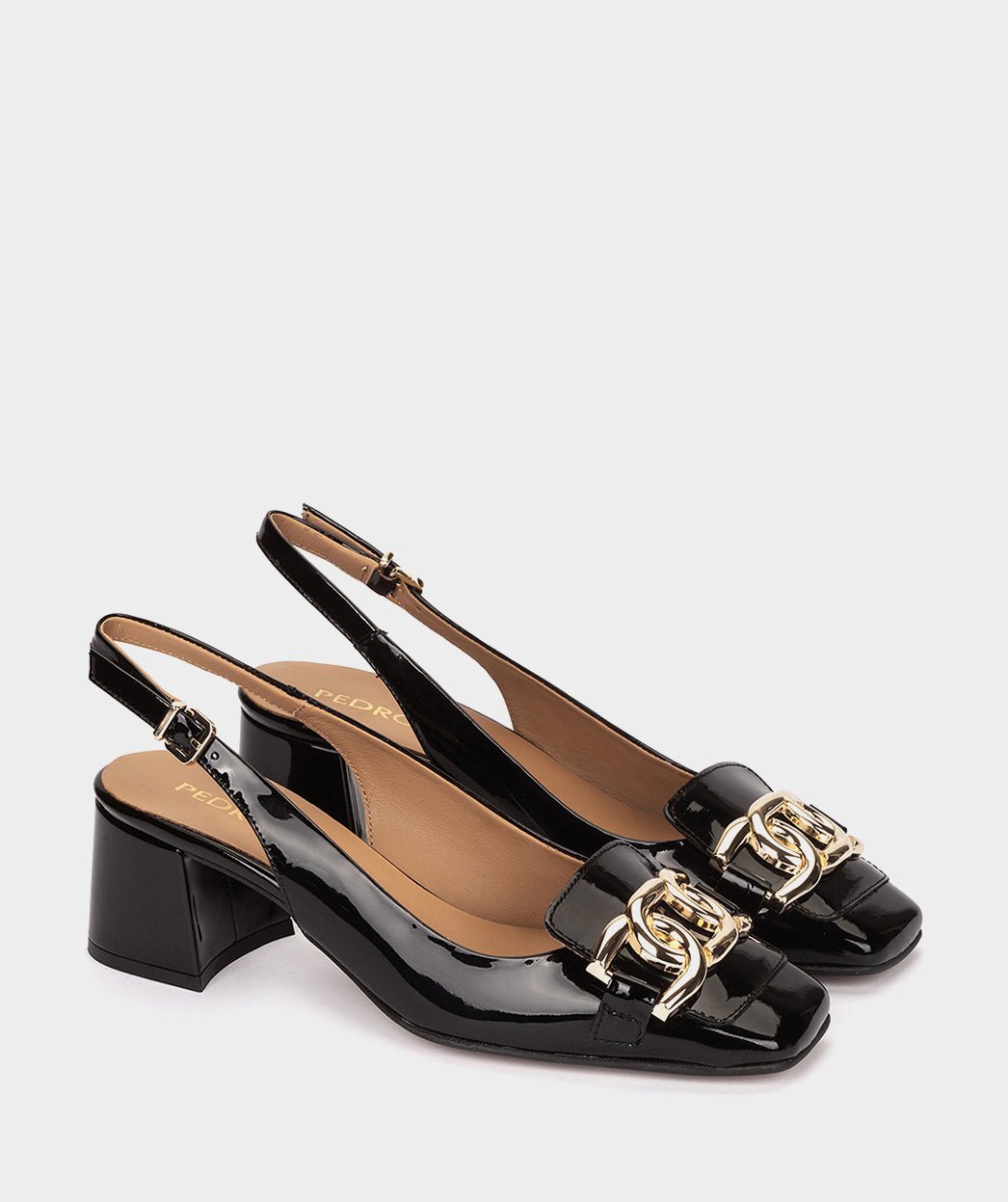 <p>Black patent leather high-heeled shoes, open back.</p> PEDRO MIRALLES Black