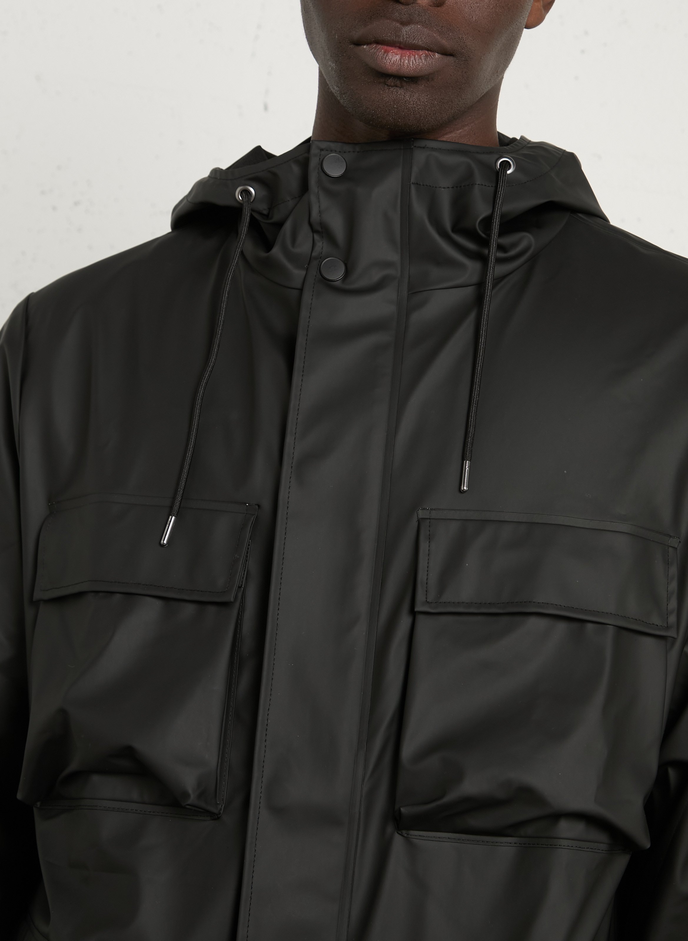 Katoenen parka met capuchon RAINS Zwart