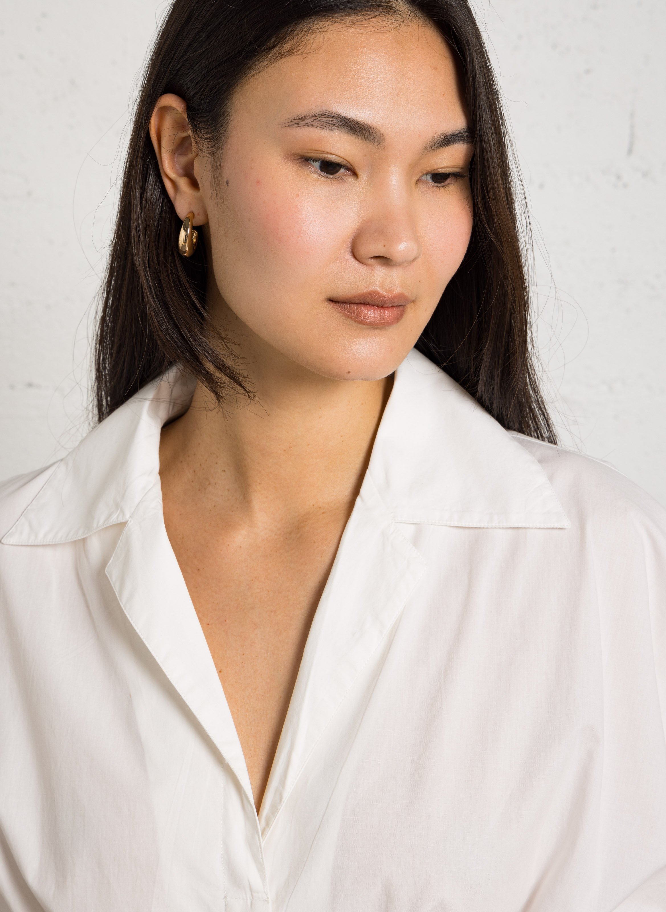 - Narrow tie straps- Racer back- Loose fit- Gathers- 100% cotton- Lined- Back length: 94 cm. BELLEPIECE White