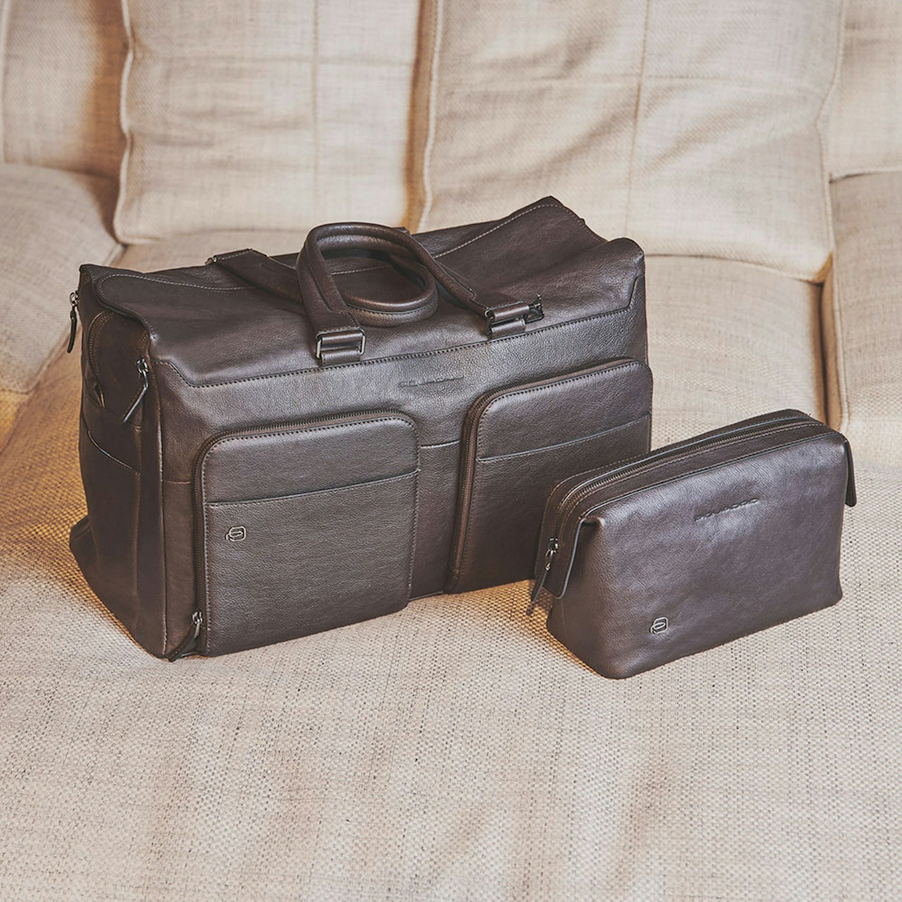 Leather toiletry bag PIQUADRO Brown