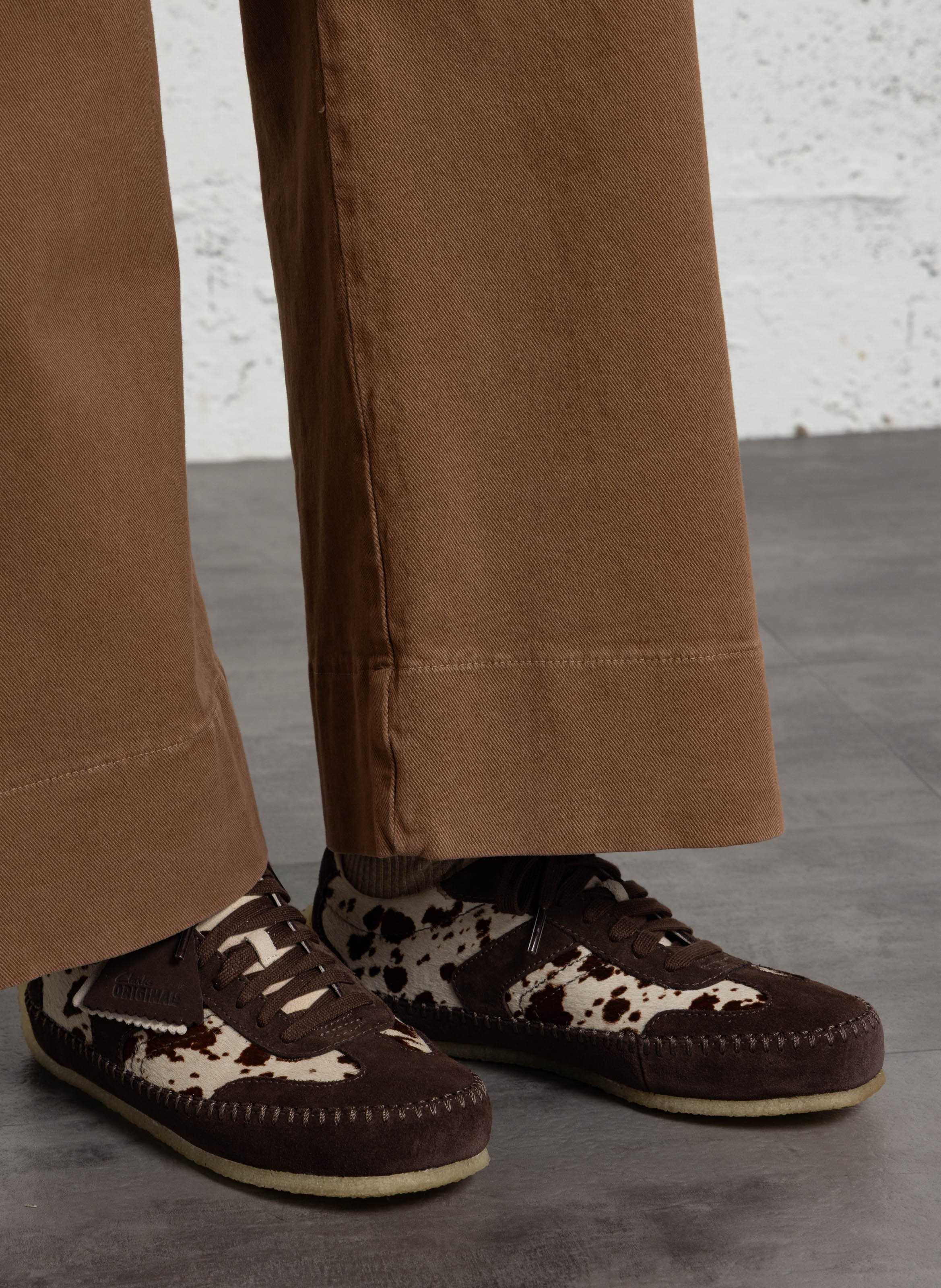 Low-top sneakers with animal print in leather. CLARKS Brown