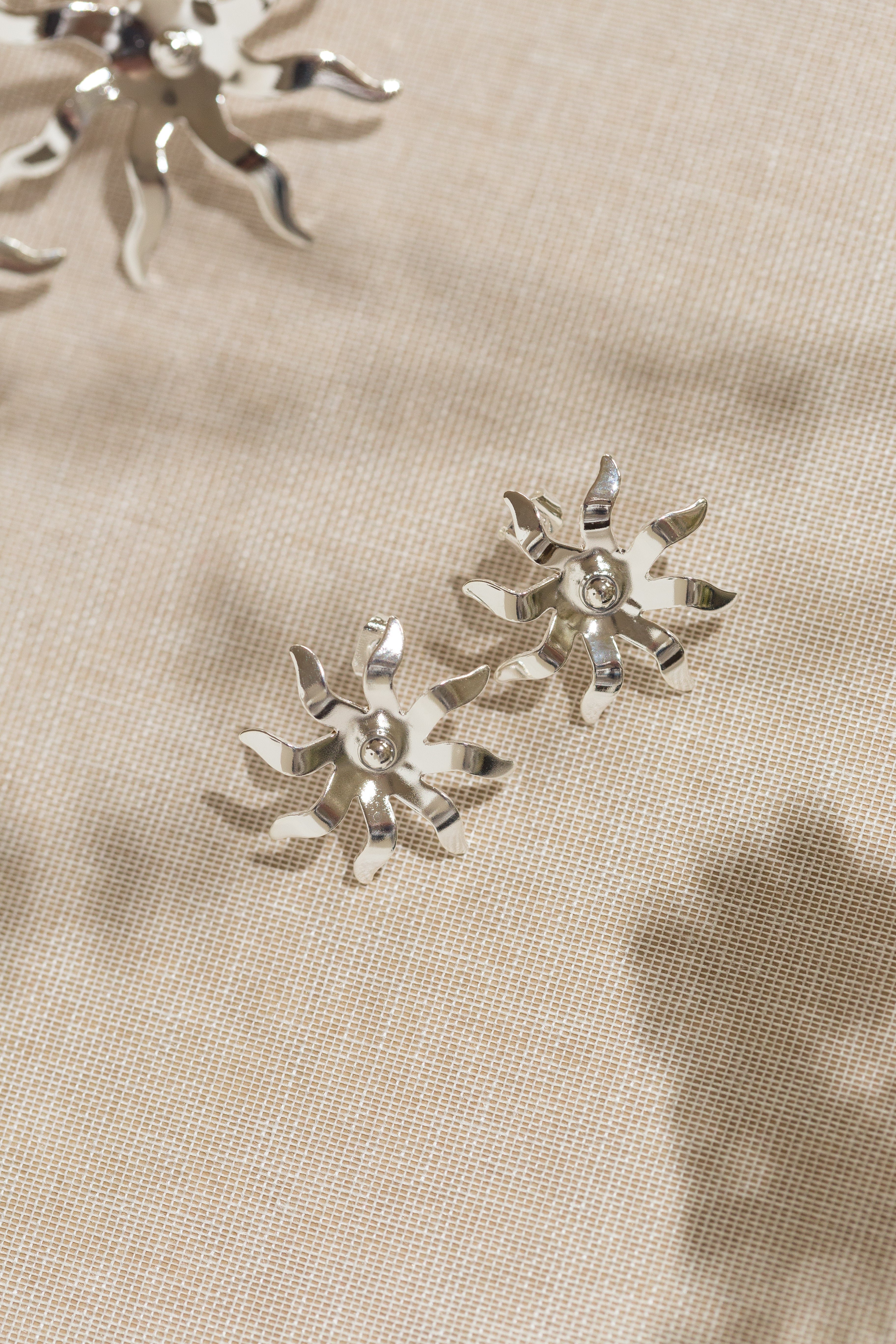 Sunburst gold-plated stud earrings Silver