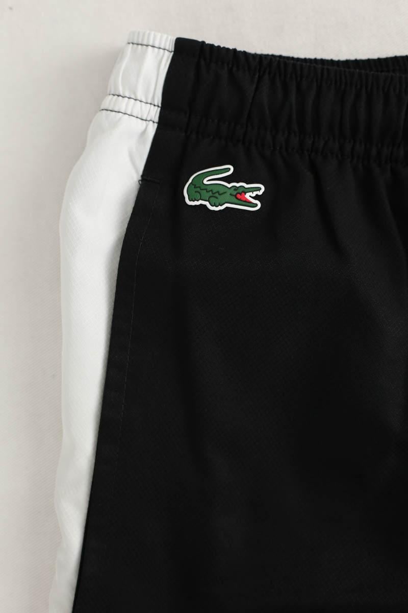 Sports trousers LACOSTE - SECONDE MAIN Black